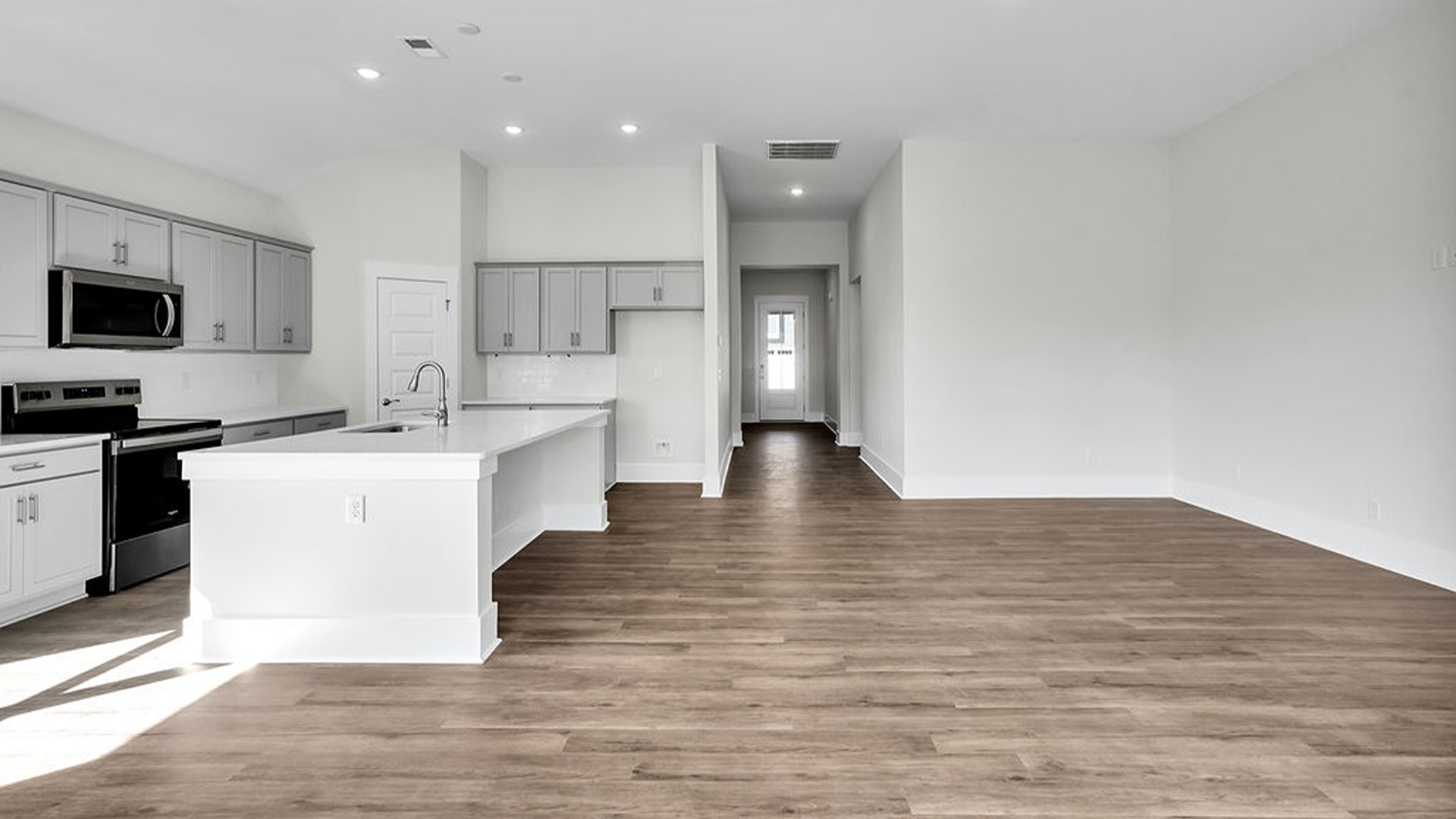 The living area is an open concept, where your kitchen, living, and dining areas blend seamlessly into a space perfect for everyday living and entertaining.