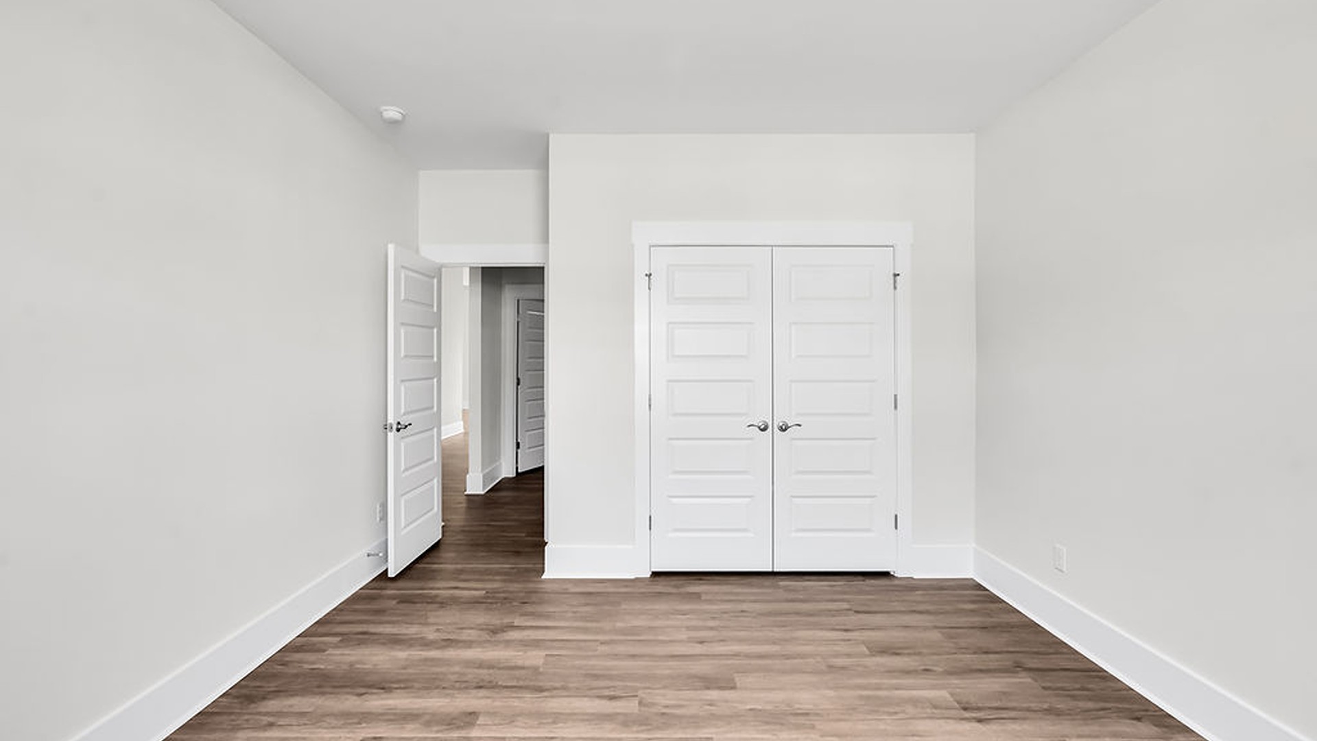 The primary suite features a step-in 5-foot shower and dual vanity.