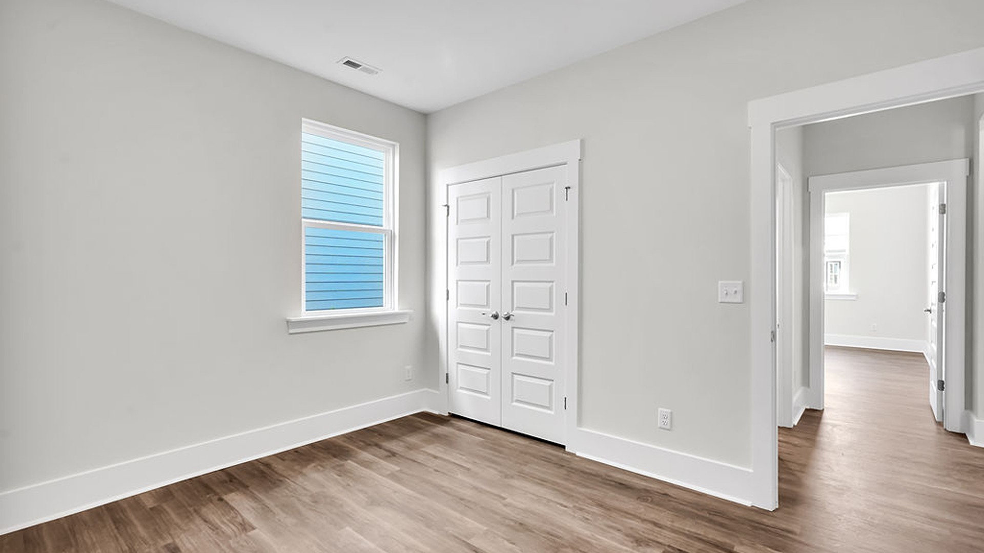 Luxury vinyl plank flooring is included throughout primary living areas, giving you a wood-like look with the durability to handle all your beach days.