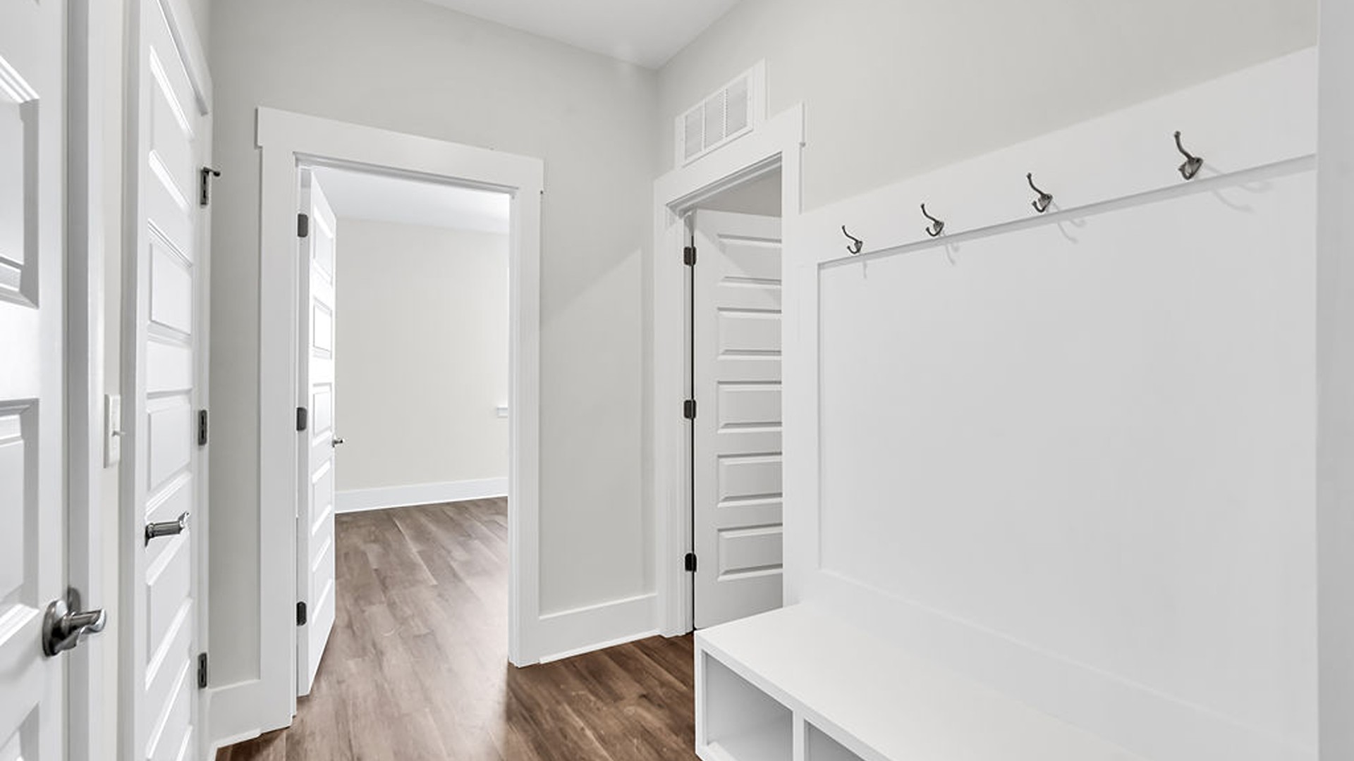 Luxury vinyl plank flooring is included throughout primary living areas, giving you a wood-like look with the durability to handle all your beach days.