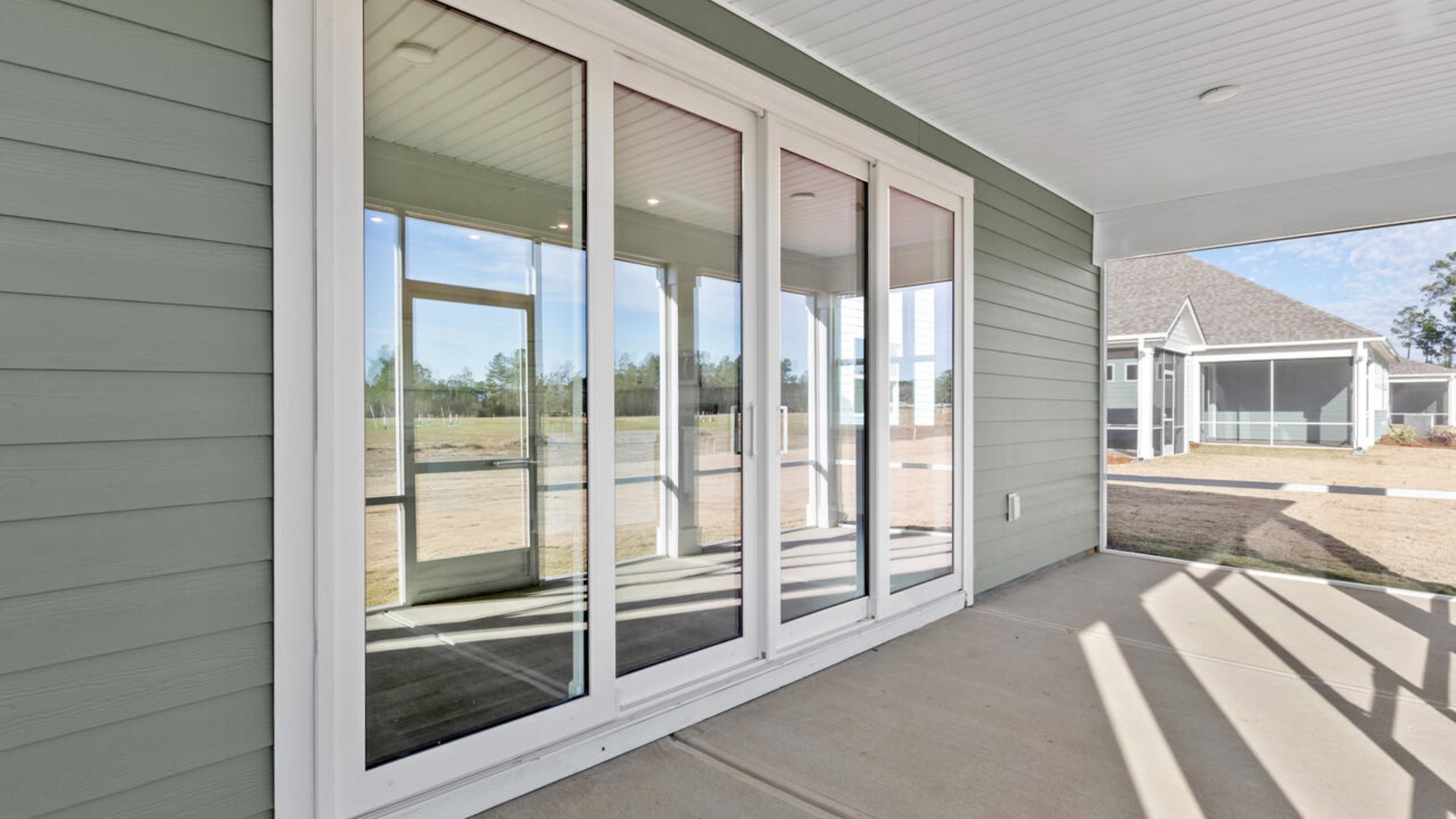 Enjoy the screened in covered porch, perfect for entertaining and enjoying the Carolina evenings