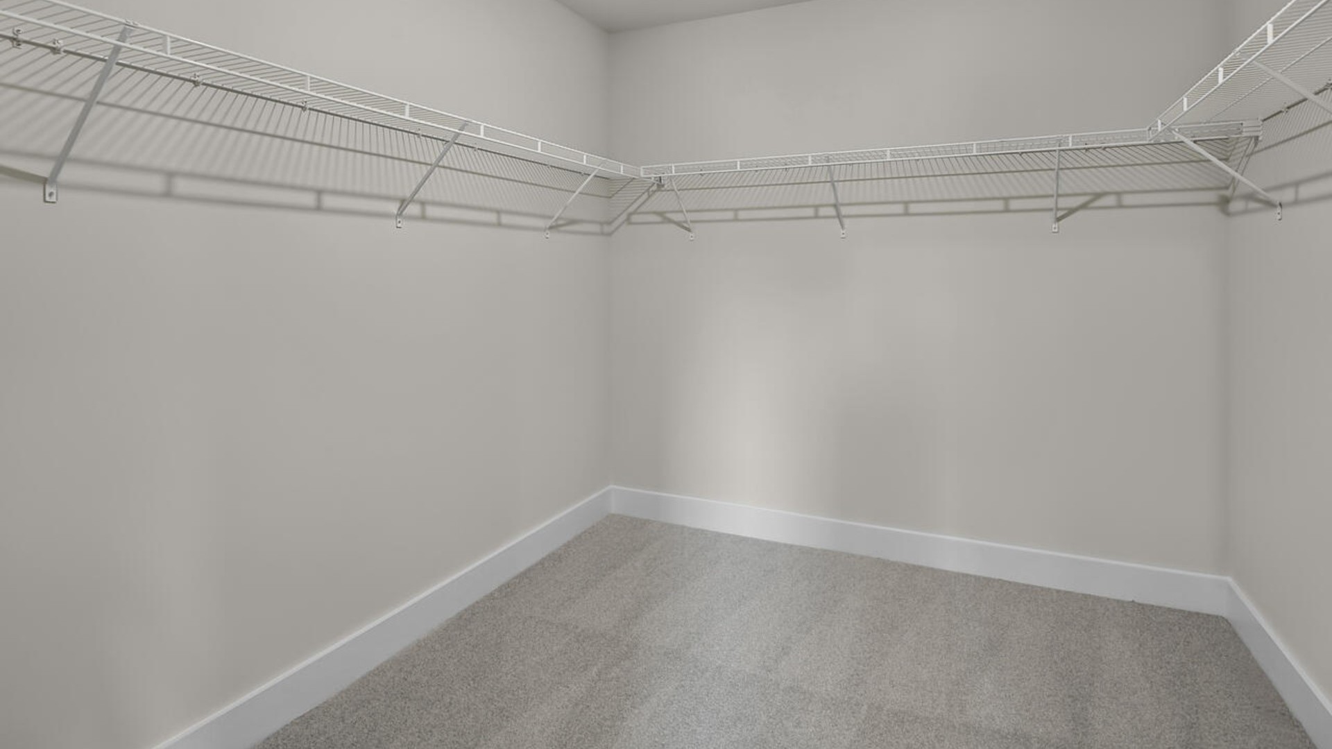 The Forrester's second floor includes a primary retreat with a substantial walk-in closet, laundry room, and a large bonus room.