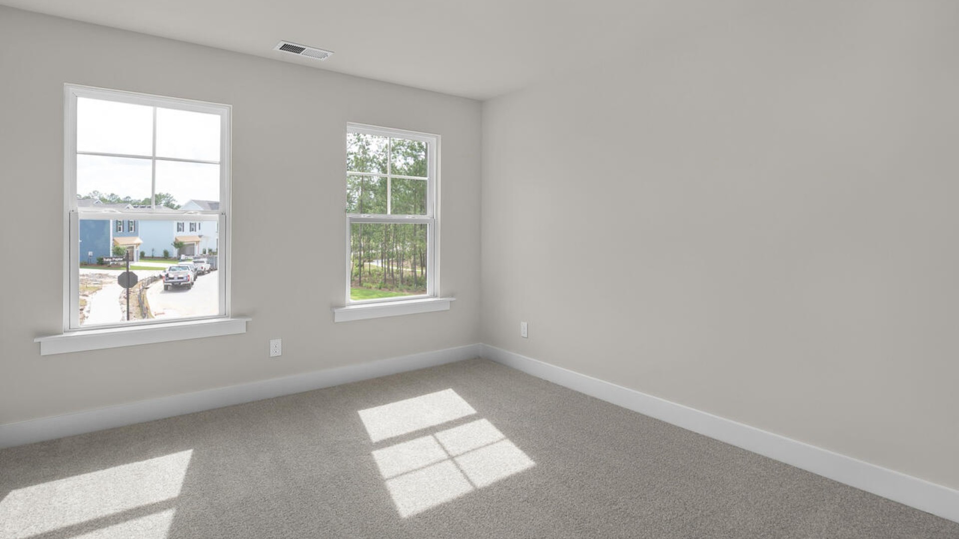 The Forrester's second floor includes a primary retreat with a substantial walk-in closet, laundry room, and a large bonus room.