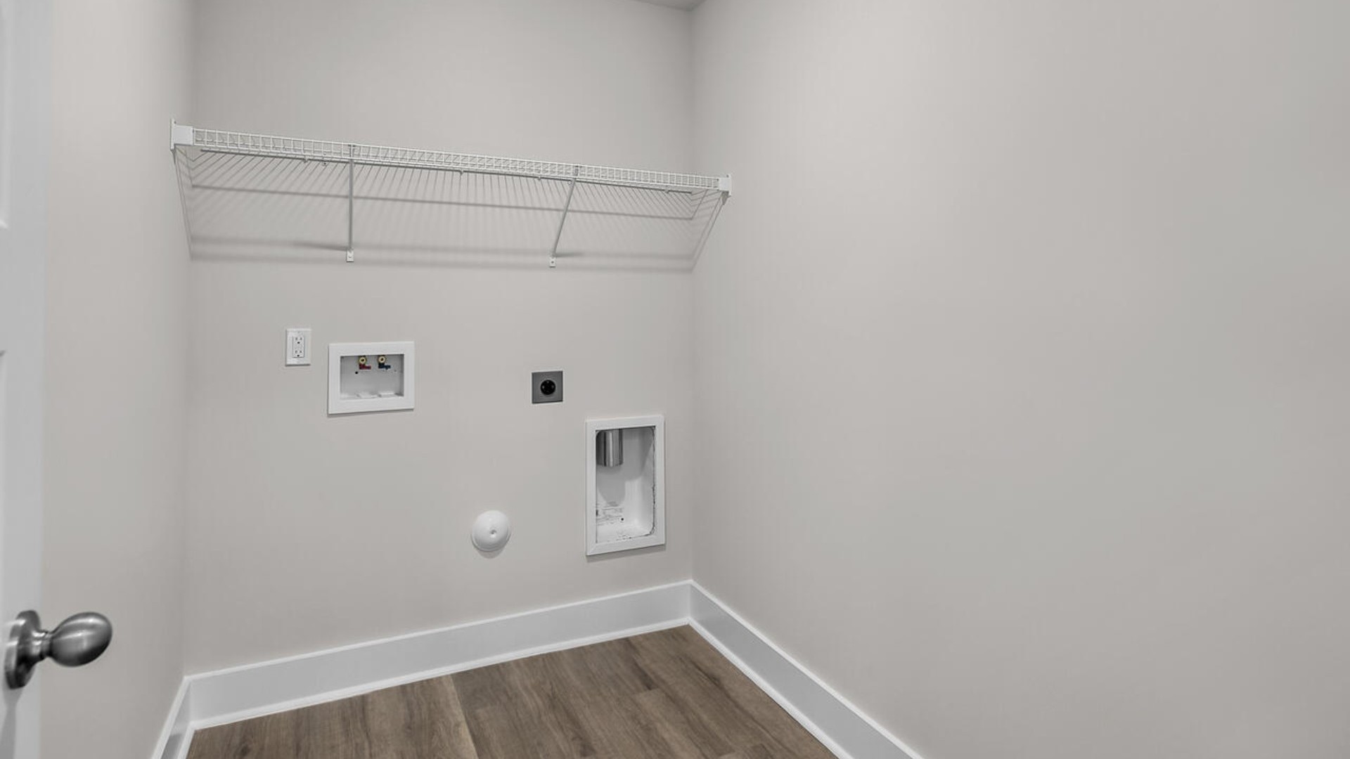 The Forrester's second floor includes a primary retreat with a substantial walk-in closet, laundry room, and a large bonus room.