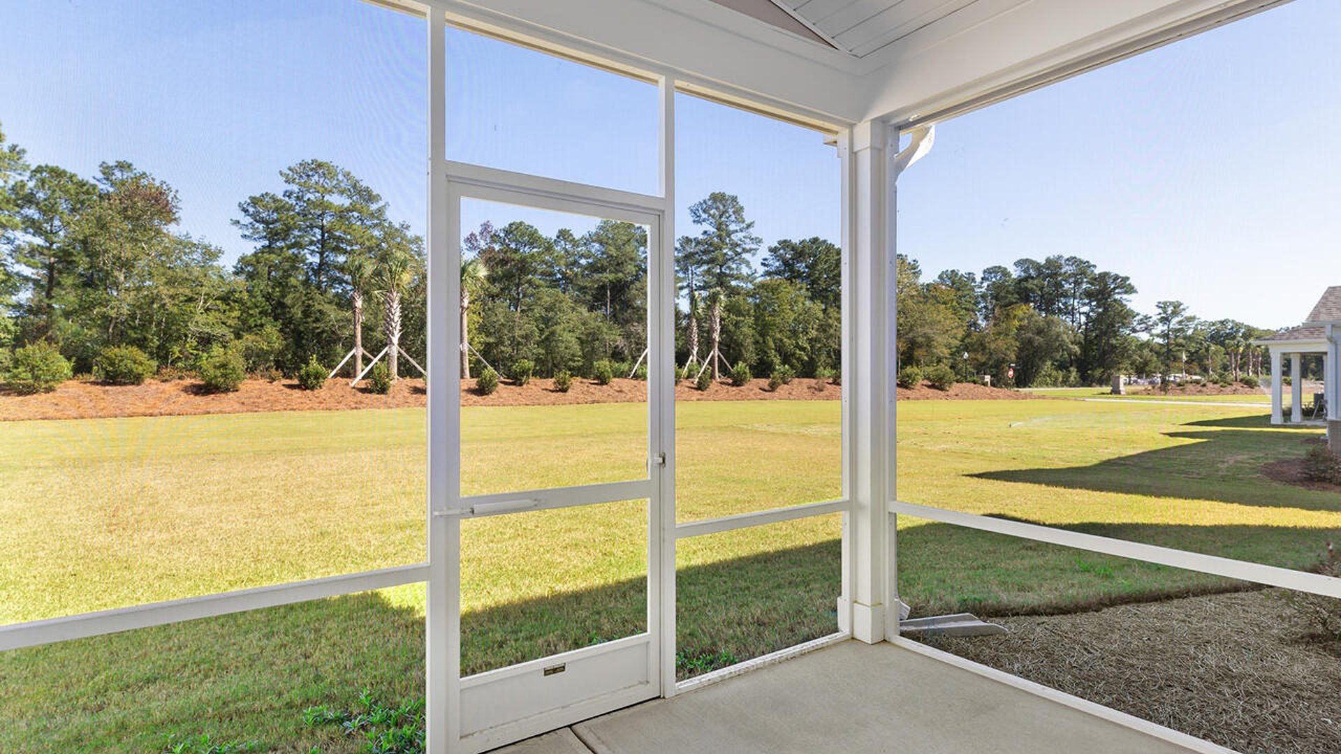 Enjoy the covered screened porch perfect for entertaining and enjoying the Carolina evenings.
