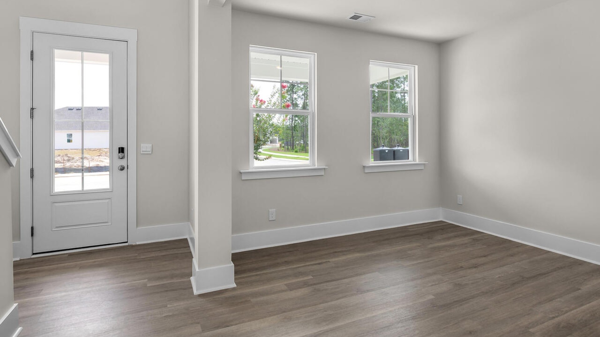 you’ll find 2,643 square feet of comfortable living. Featuring a formal dining room adjoining the kitchen, large island with quartz countertops, tile backsplash and open concept living space.