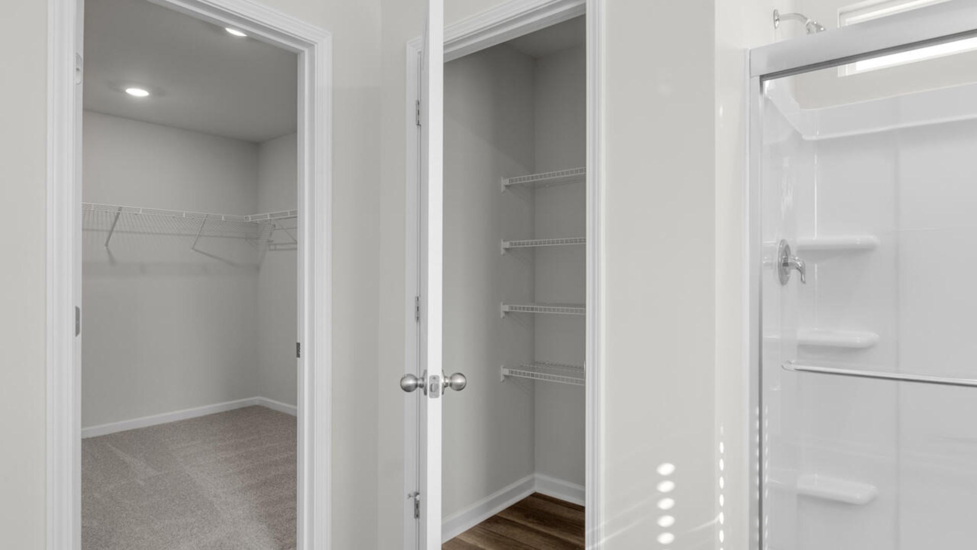 The Forrester's second floor includes a primary retreat with a substantial walk-in closet, laundry room, and a large bonus room.