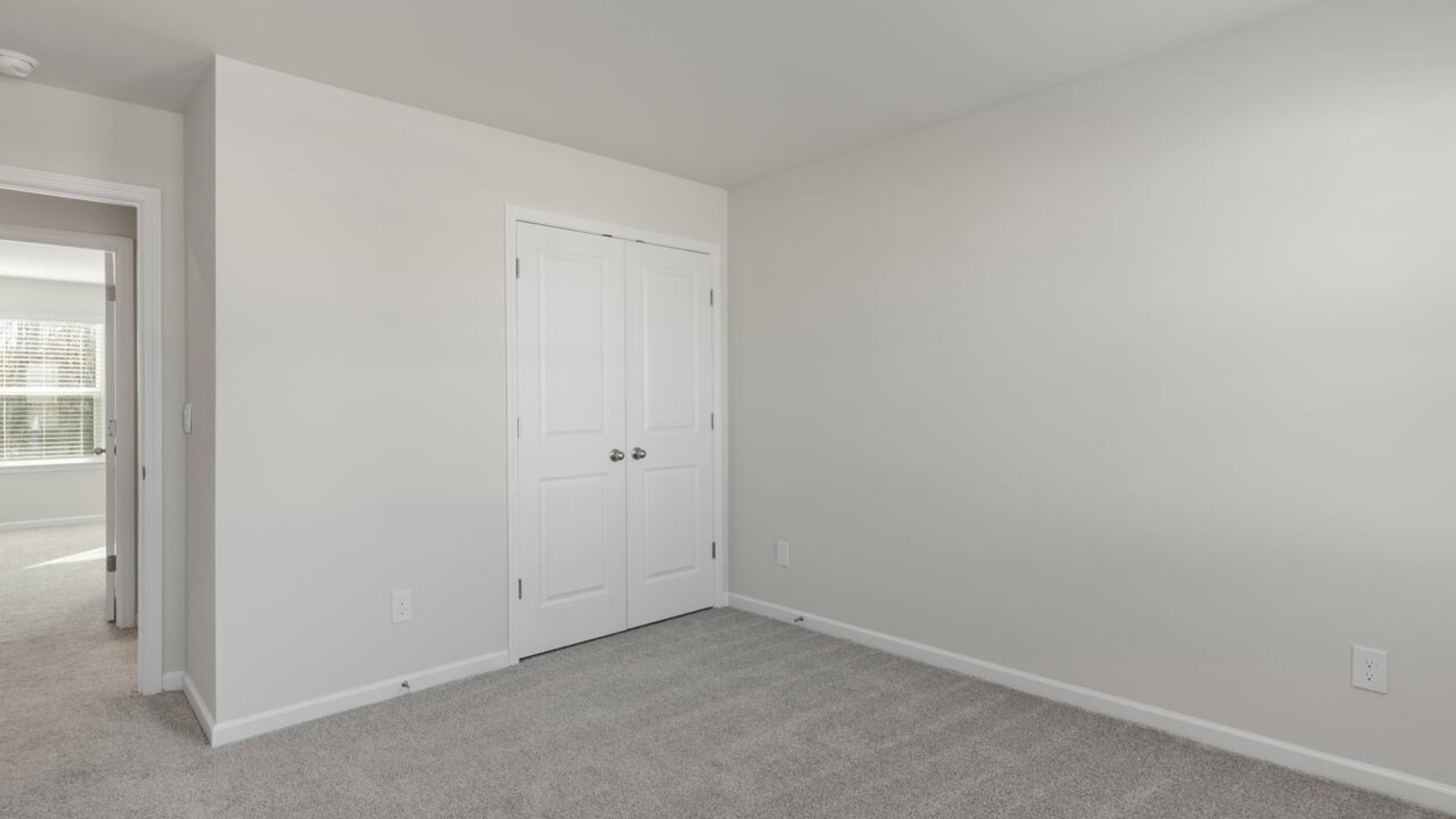 The Forrester's second floor includes a primary retreat with a substantial walk-in closet, laundry room, and a large bonus room.