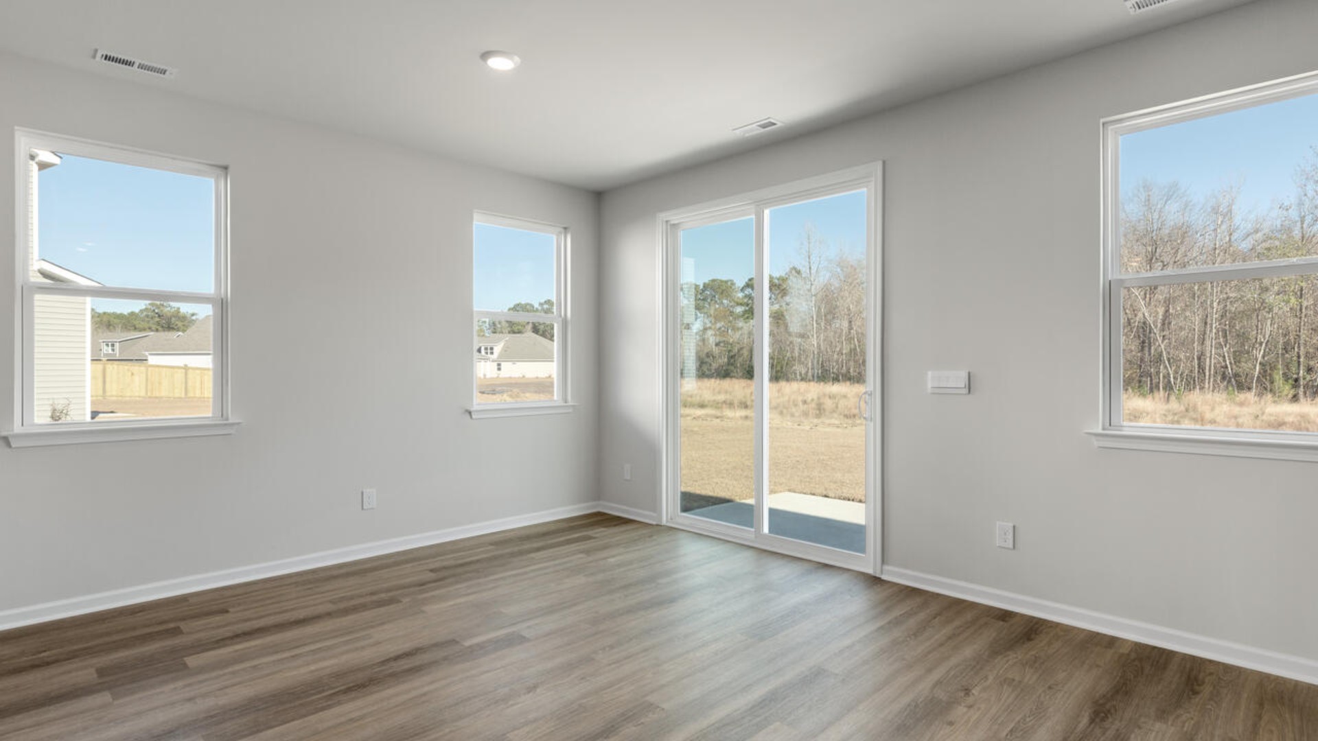 Downstairs there is a formal dining room that leads into a large butler's pantry then the kitchen. The kitchen is loaded with features including a granite island, 36'' cabinets, stainless-steel appliances and opens up to the living ro