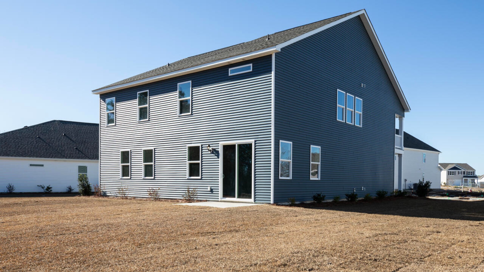 The primary suite spans the whole back of the home with a sitting room. The primary suite bath features a step-in 5' shower and a dual vanity. Large upstairs loft with closets for storage. Upstairs you are greeted by a convenient loft, a laundry room, and the primary retreat, which boasts the suite's sitting room and substantial walk-in closet.