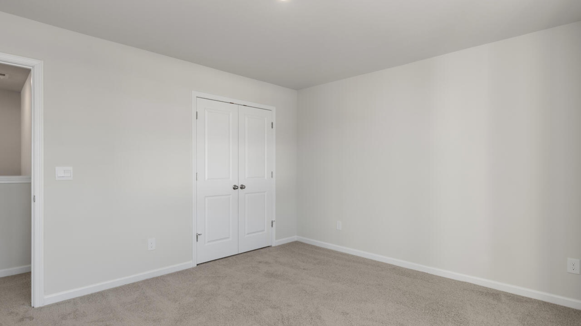 Upstairs you are greeted by a convenient loft, a laundry room, and the primary retreat, which boasts the suite's sitting room and substantial walk-in closet.