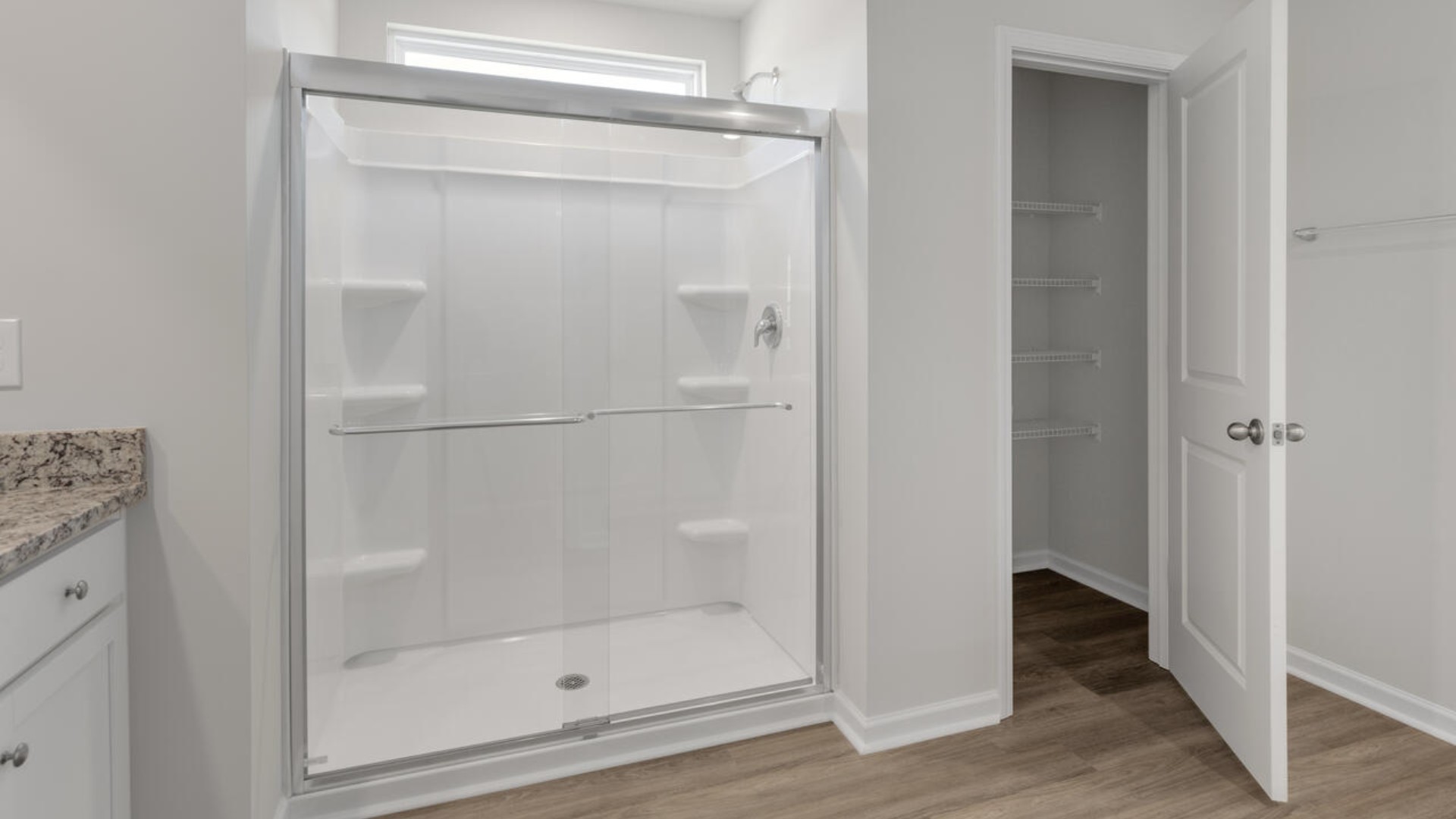 Large upstairs loft with closets for storage. Upstairs you are greeted by a convenient loft, a laundry room, and the primary retreat, which boasts the suite's sitting room and substantial walk-in closet