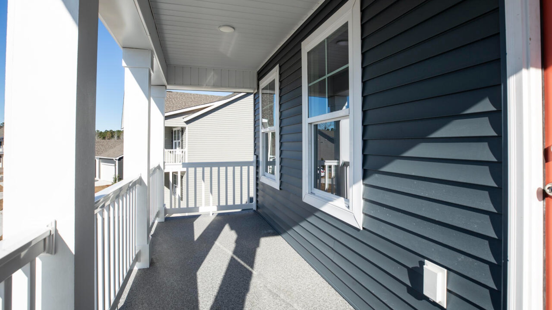 Large upstairs loft with closets for storage. Upstairs you are greeted by a convenient loft, a laundry room, and the primary retreat, which boasts the suite's sitting room and substantial walk-in closet