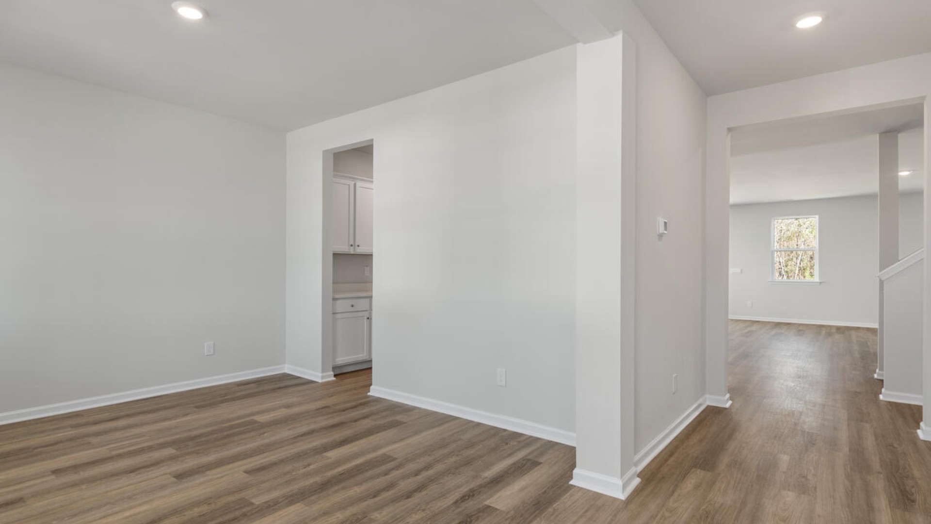 Upon entering the home, you are greeted by a wide foyer and formal dining room.
