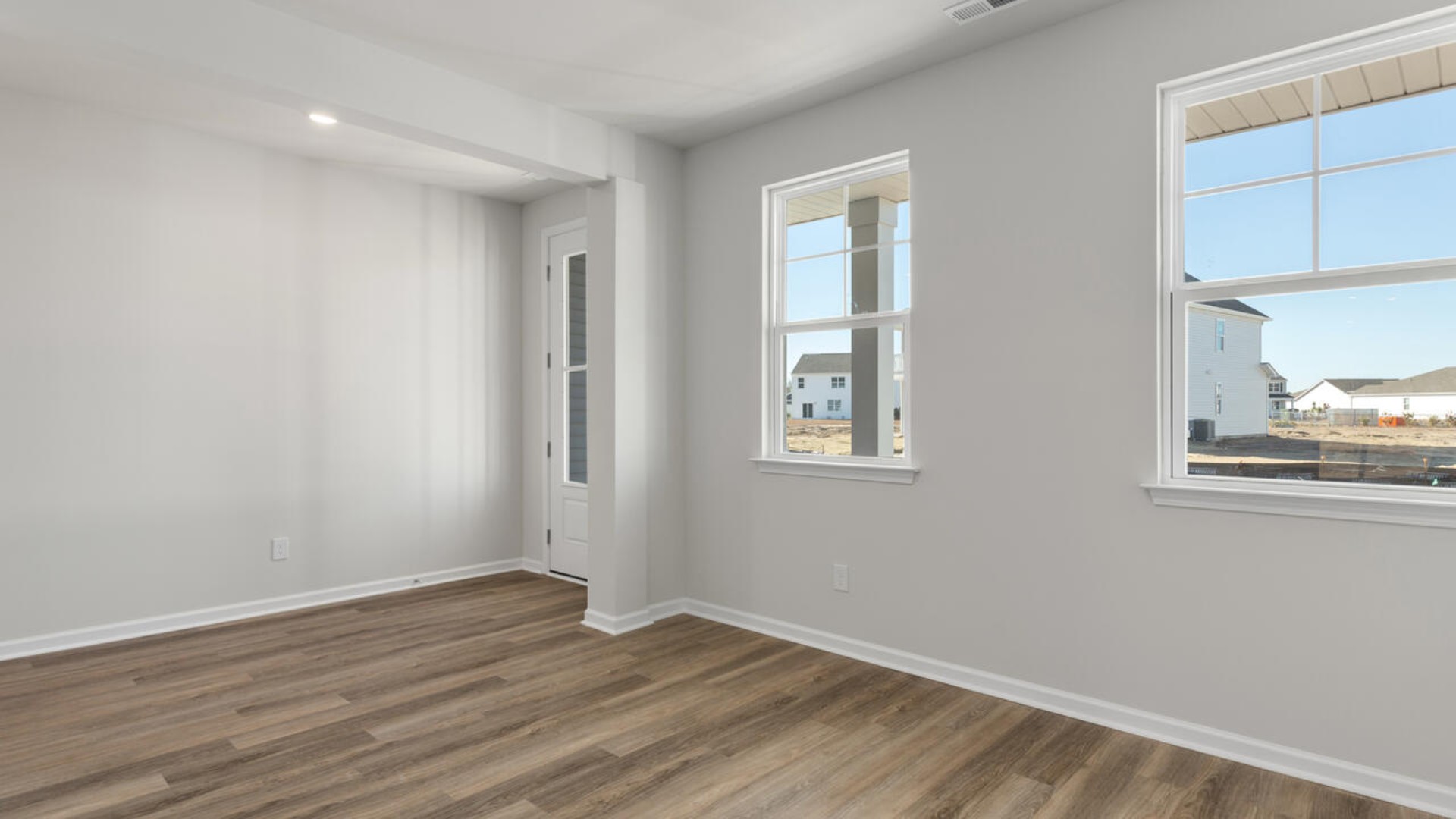 Upon entering the home, you are greeted by a wide foyer and formal dining room.