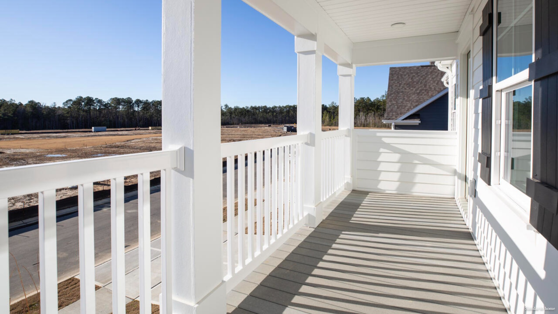 Upstairs, a private balcony off one of the guest suites adds a special touch and place to unwind.