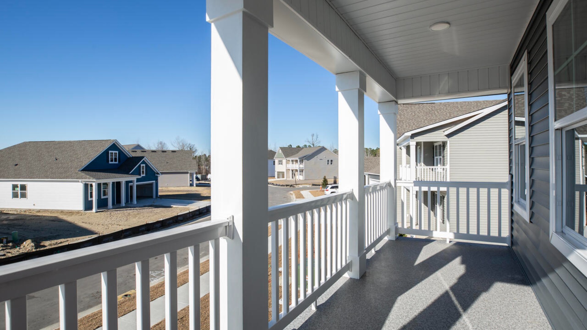 Upstairs you are greeted by a convenient loft, a laundry room, and the primary retreat, which boasts the suite's sitting room and substantial walk-in closet.