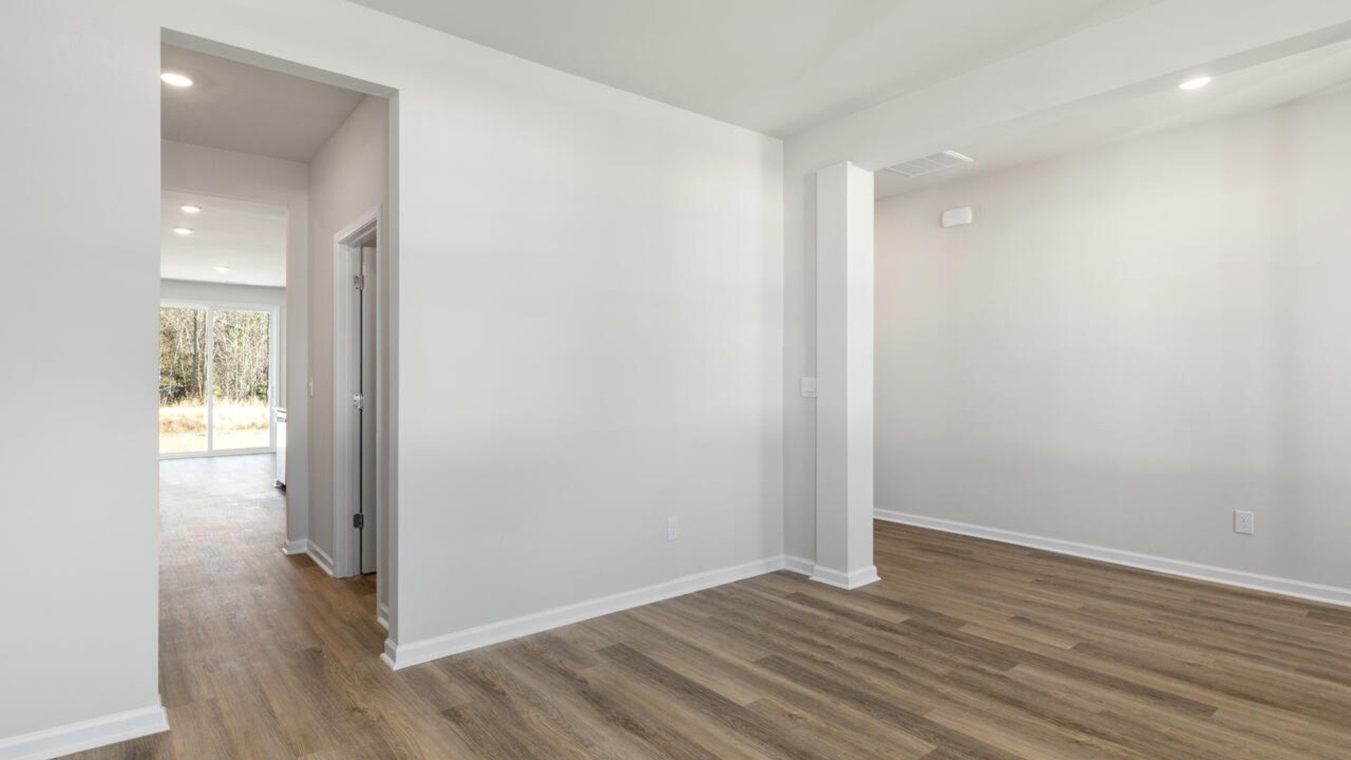 Downstairs there is a formal dining room that leads into a large butler's pantry then the kitchen. The kitchen is loaded with features including a granite island, 36'' cabinets, tile backsplash, stainless-steel appliances and opens up to the living room.