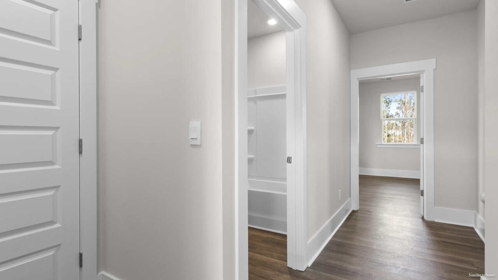 Upstairs you are greeted by a convenient loft, a laundry room, and the primary retreat, which boasts the suite's sitting room and substantial walk-in closet.