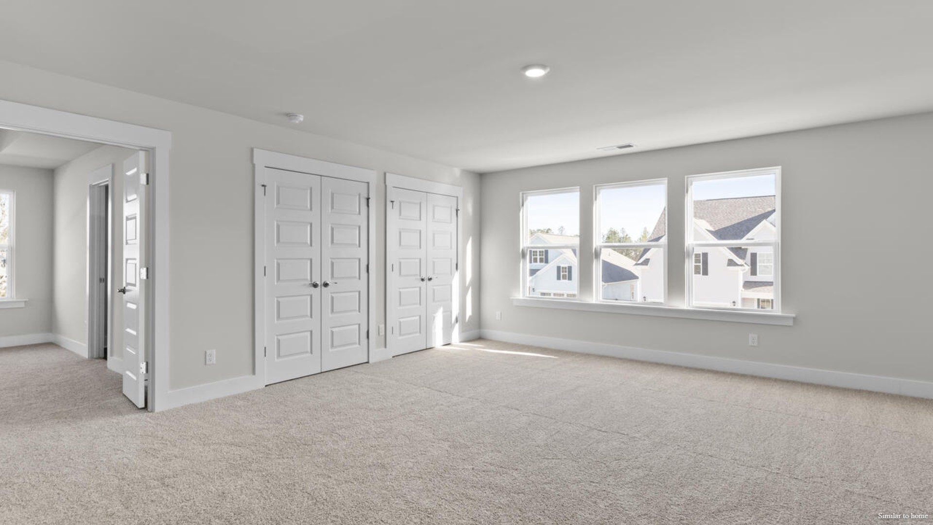 Upstairs you are greeted by a convenient loft, a laundry room, and the primary retreat, which boasts the suite's sitting room and substantial walk-in closet.