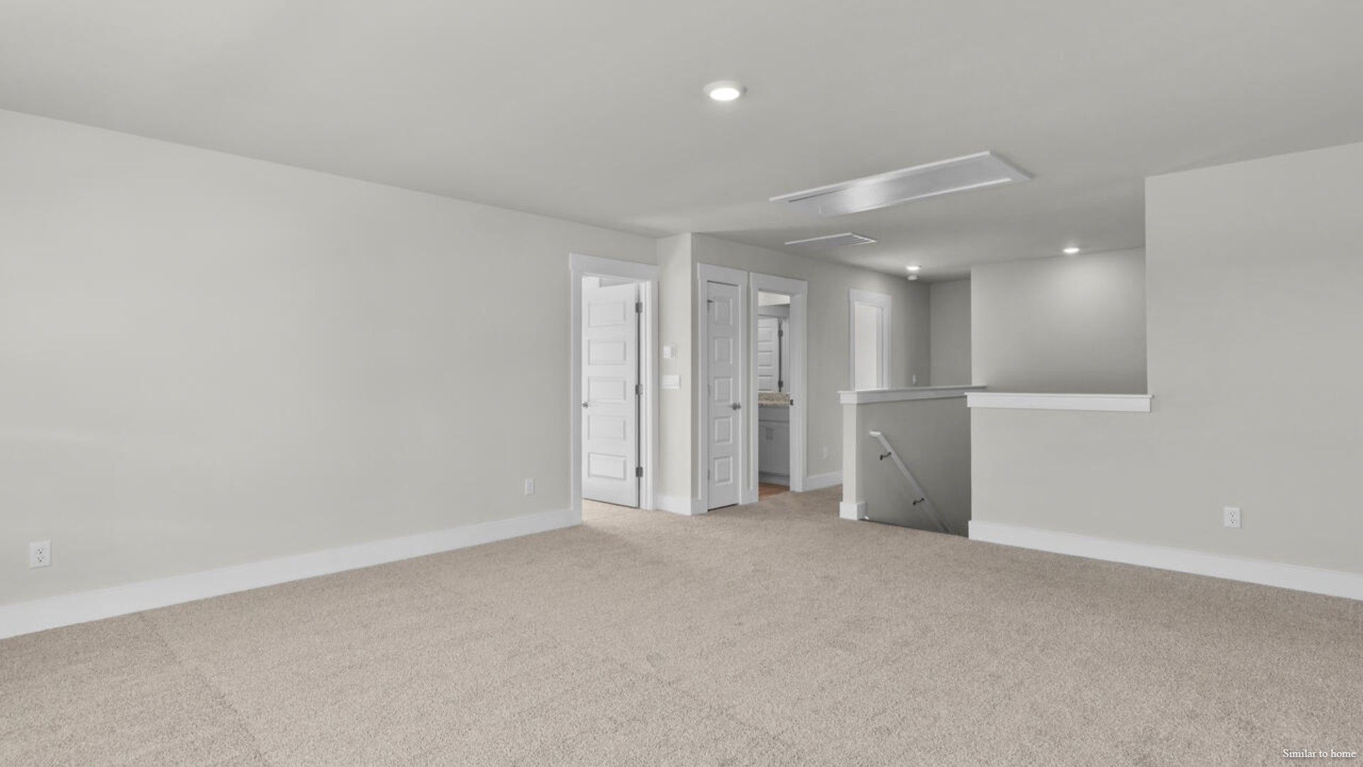 Upstairs you are greeted by a convenient loft, a laundry room, and the primary retreat, which boasts the suite's sitting room and substantial walk-in closet.