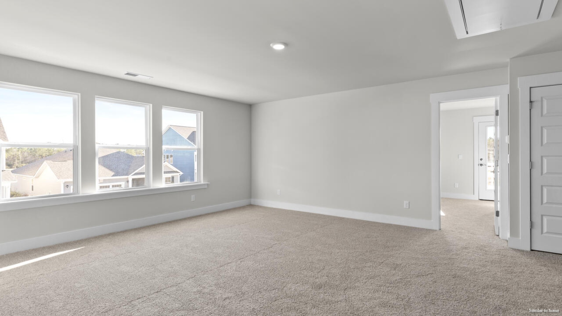 Upstairs you are greeted by a convenient loft, a laundry room, and the primary retreat, which boasts the suite's sitting room and substantial walk-in closet.