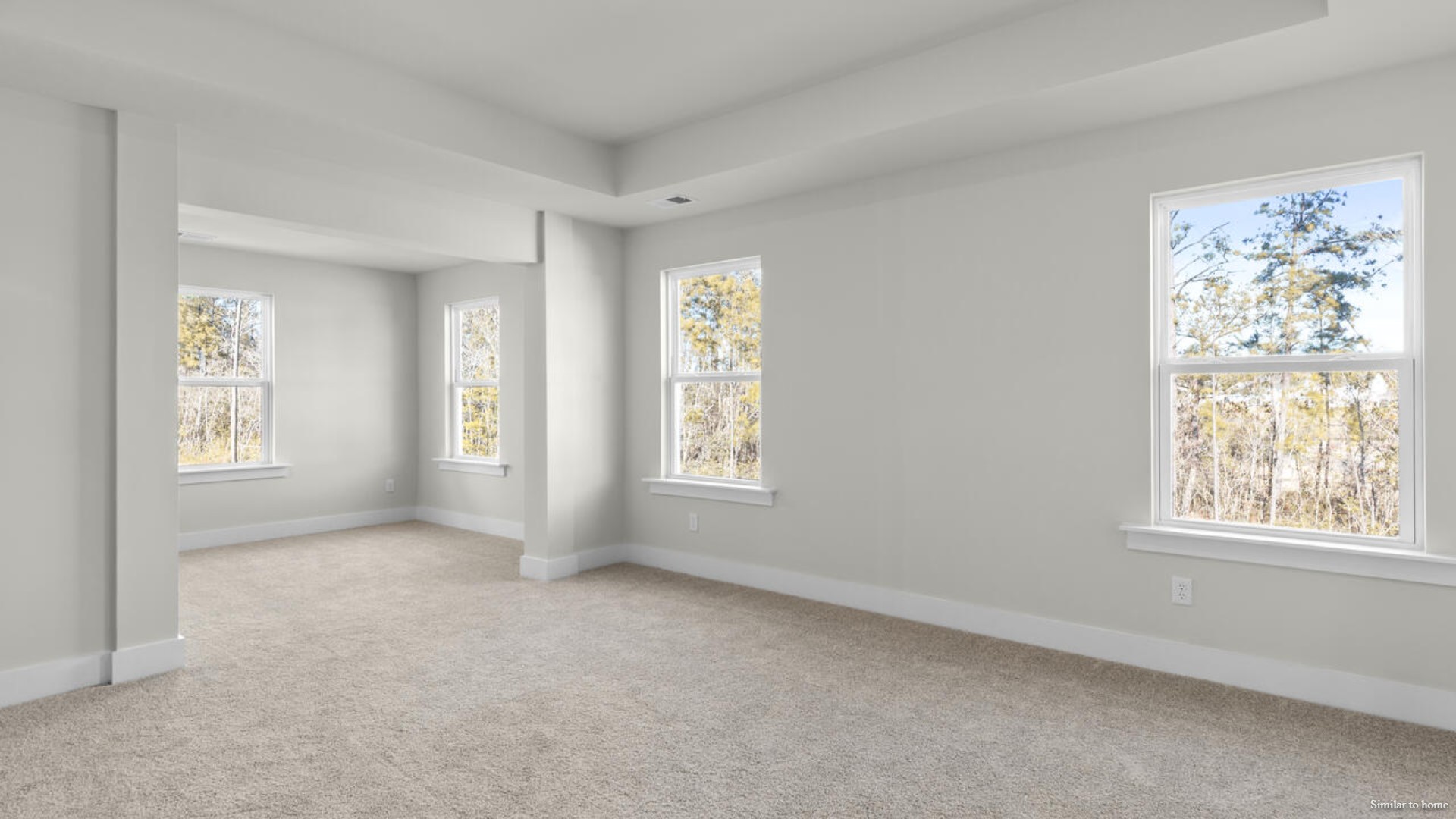 Upstairs you are greeted by a convenient loft, a laundry room, and the primary retreat, which boasts the suite's sitting room and substantial walk-in closet.