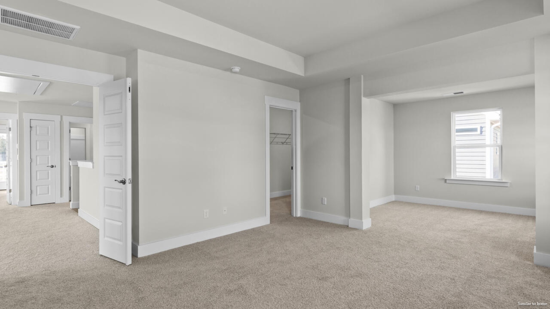 Upstairs you are greeted by a convenient loft, a laundry room, and the primary retreat, which boasts the suite's sitting room and substantial walk-in closet.