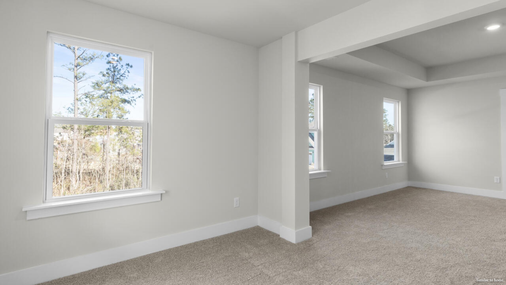Upstairs you are greeted by a convenient loft, a laundry room, and the primary retreat, which boasts the suite's sitting room and substantial walk-in closet.