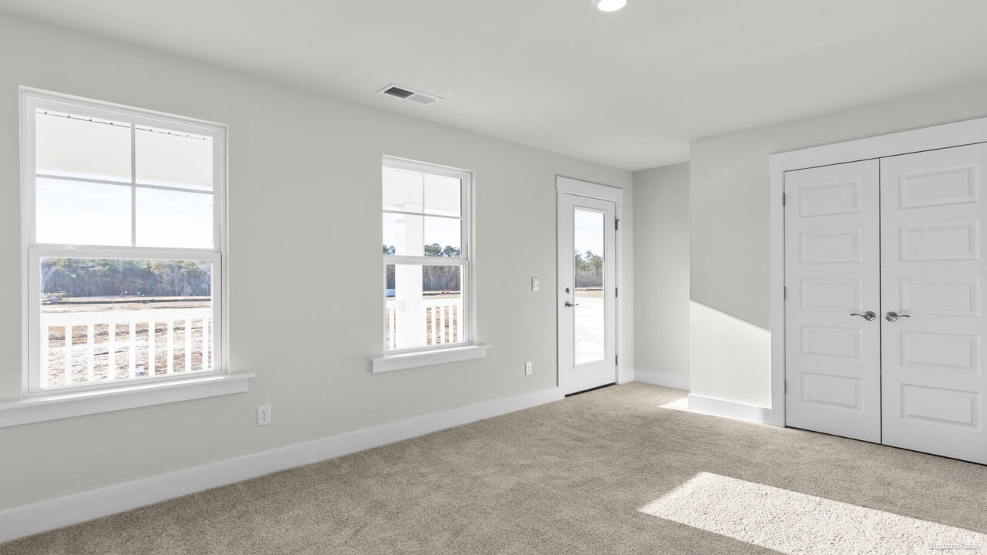 Upstairs you are greeted by a convenient loft, a laundry room, and the primary retreat, which boasts the suite's sitting room and substantial walk-in closet.