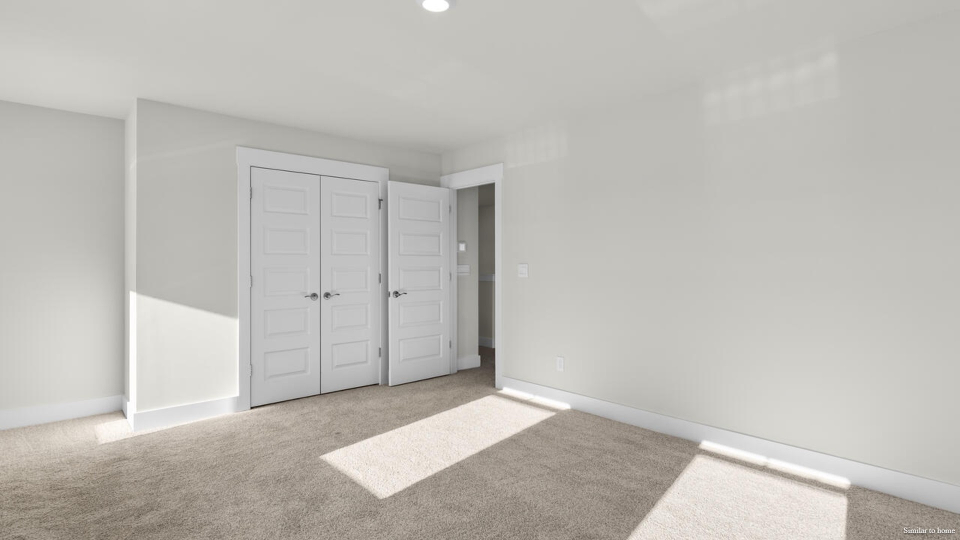 Upstairs you are greeted by a convenient loft, a laundry room, and the primary retreat, which boasts the suite's sitting room and substantial walk-in closet.