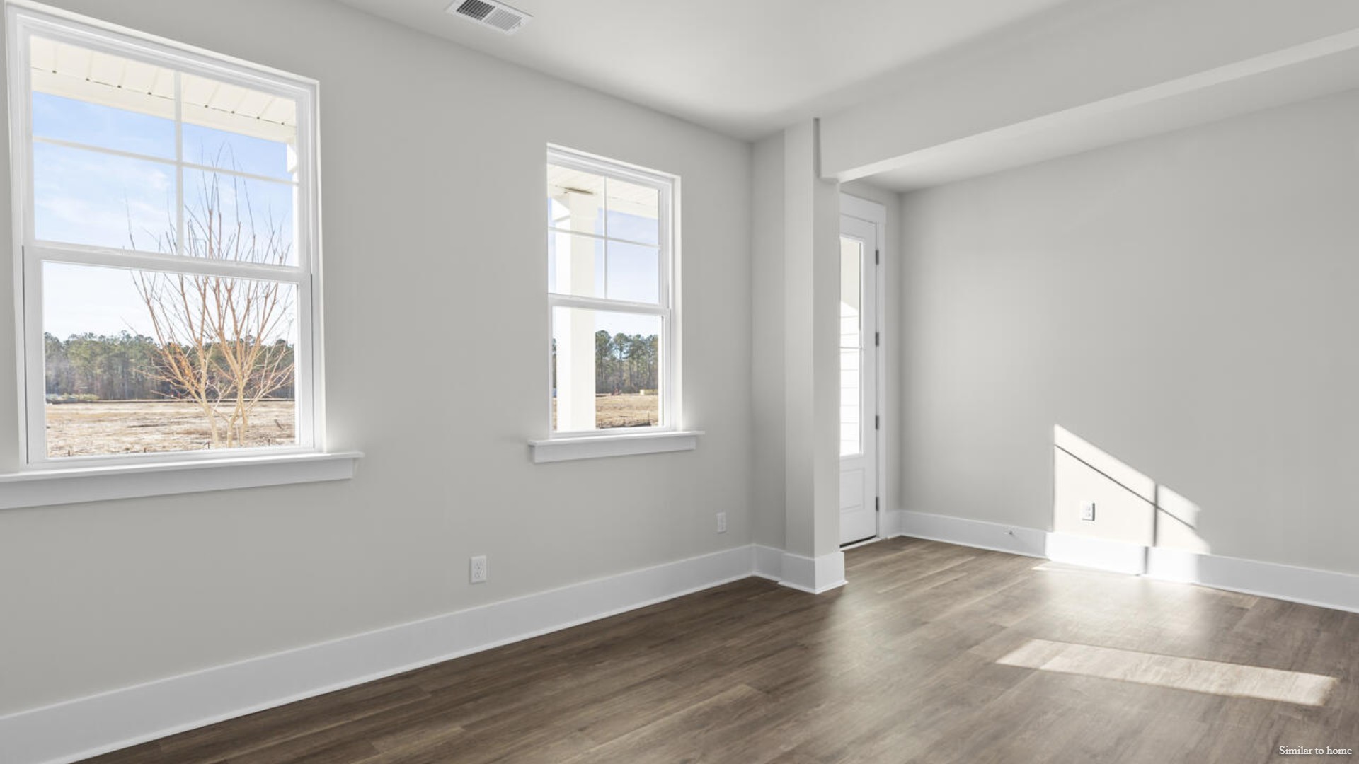Downstairs there is a formal dining room that leads into a large butler's pantry then the kitchen. The kitchen is loaded with features including a quartz island, 36'' cabinets, stainless-steel appliances and opens up to the living room.