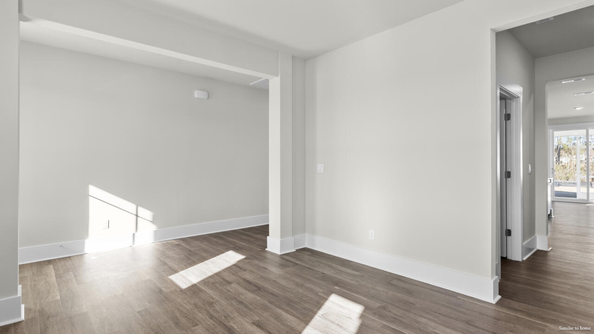 Downstairs there is a formal dining room that leads into a large butler's pantry then the kitchen. The kitchen is loaded with features including a quartz island, 36'' cabinets, stainless-steel appliances and opens up to the living room.