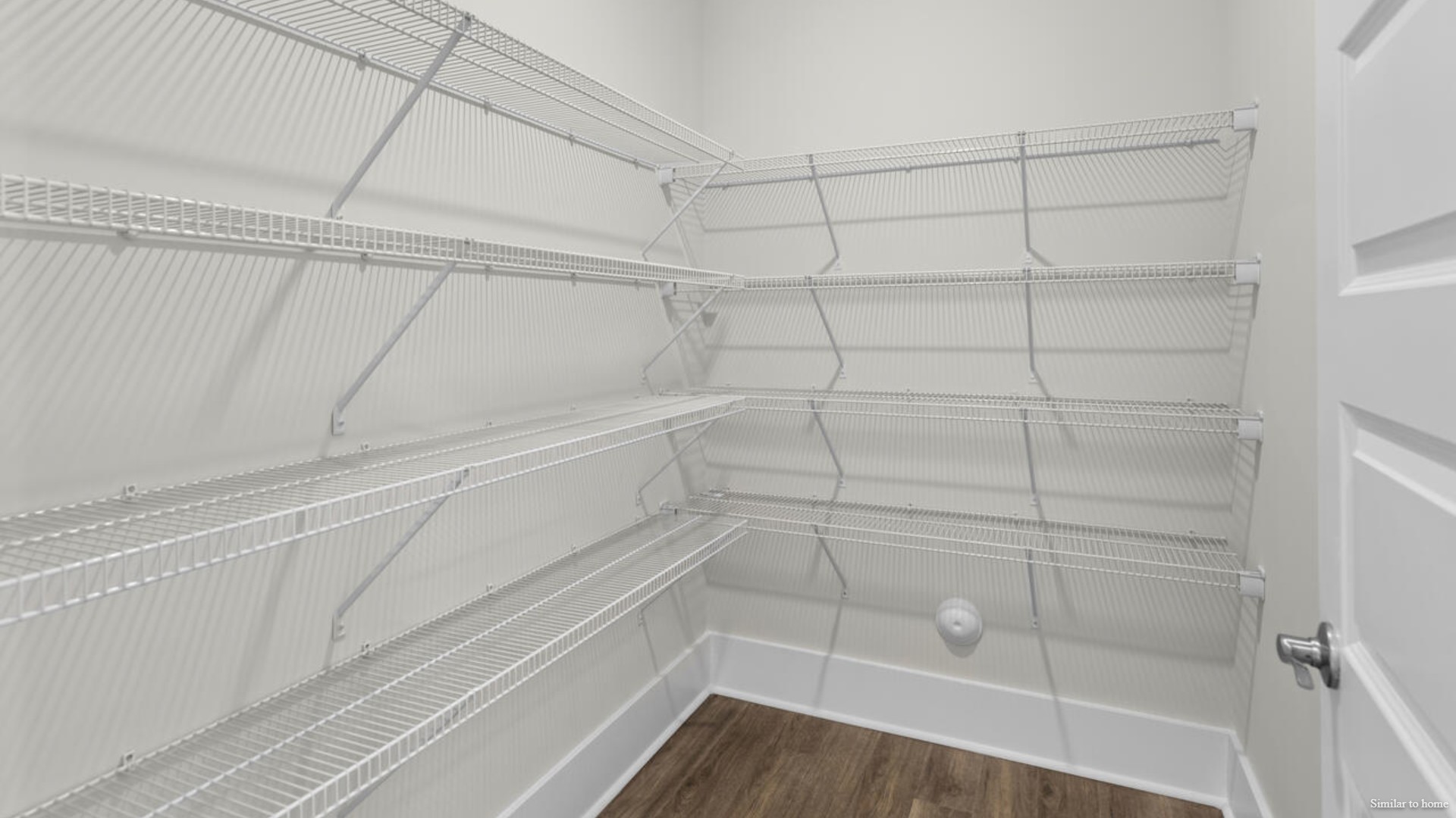 Downstairs there is a formal dining room that leads into a large butler's pantry then the kitchen. The kitchen is loaded with features including a quartz island, 36'' cabinets, stainless-steel appliances and opens up to the living room.