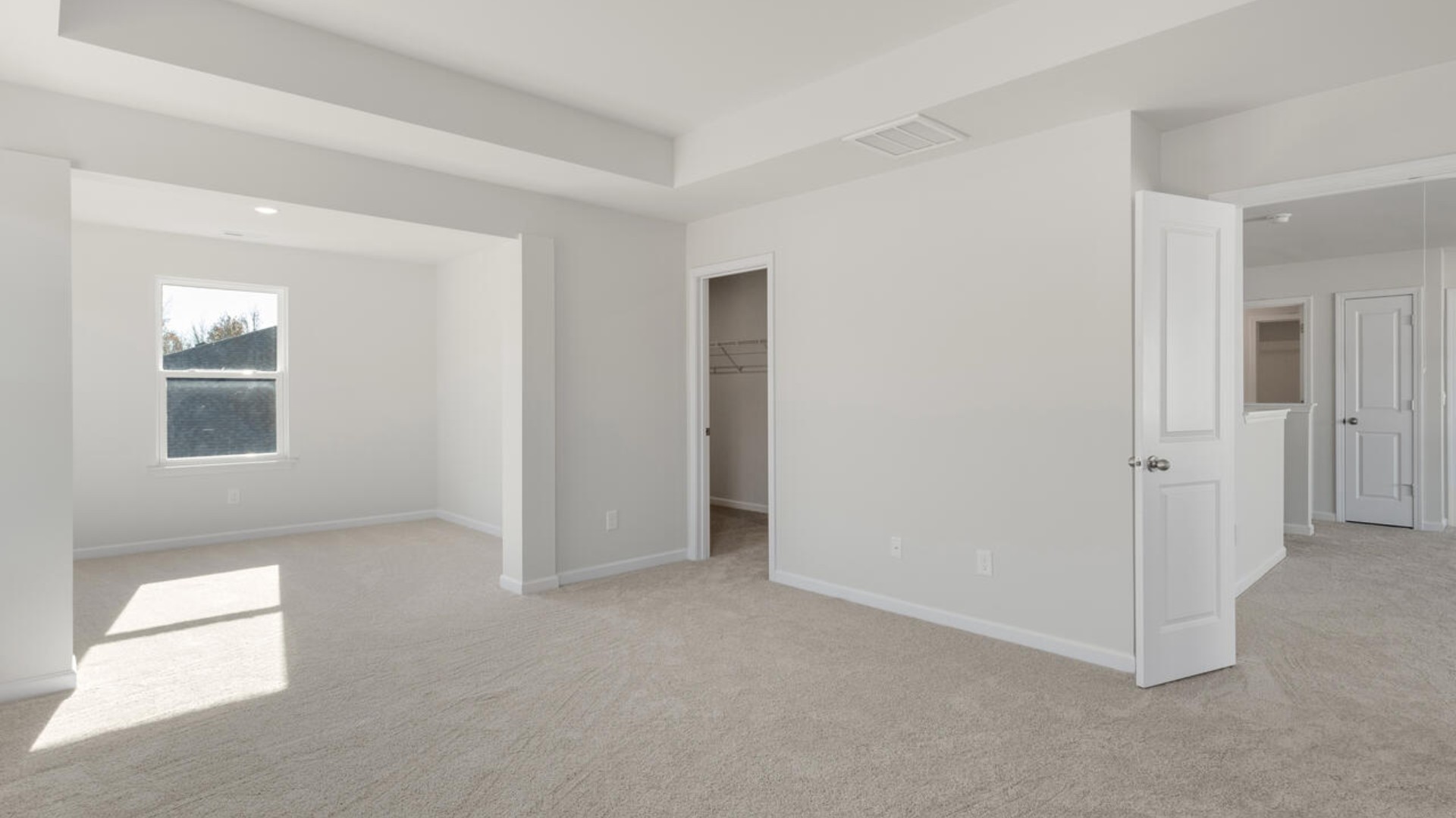 Large upstairs loft with closets for storage. Upstairs you are greeted by a convenient loft, a laundry room