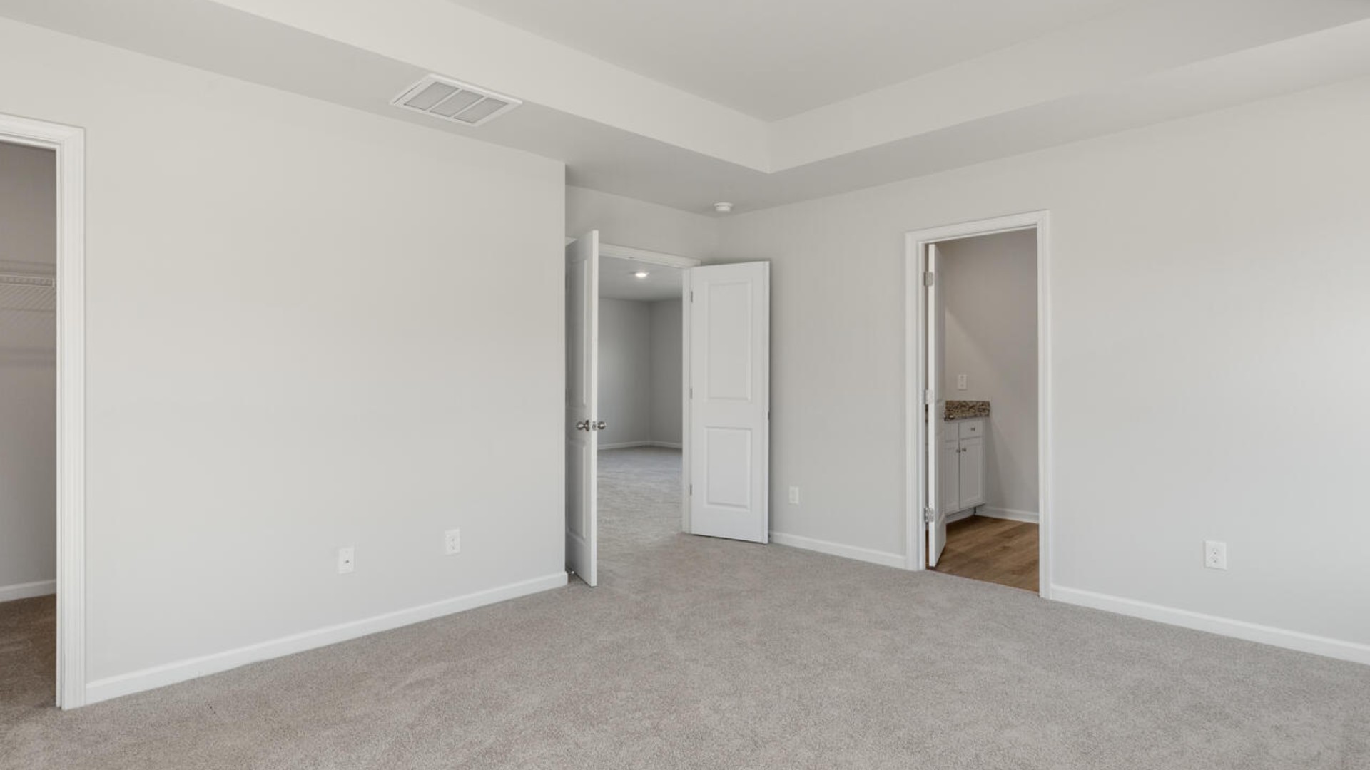 Large upstairs loft with closets for storage. Upstairs you are greeted by a convenient loft, a laundry room