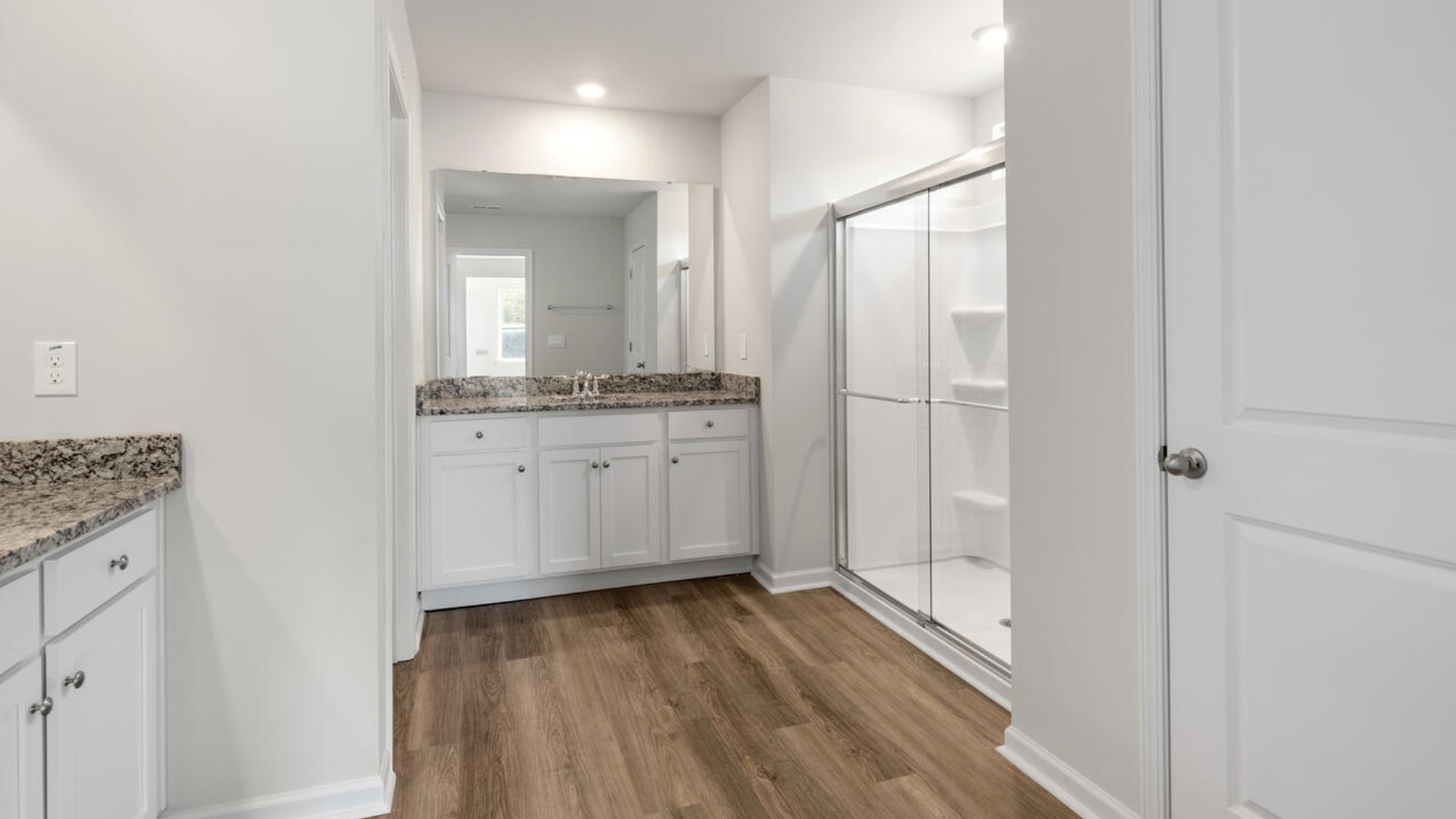 Large upstairs loft with closets for storage. Upstairs you are greeted by a convenient loft, a laundry room