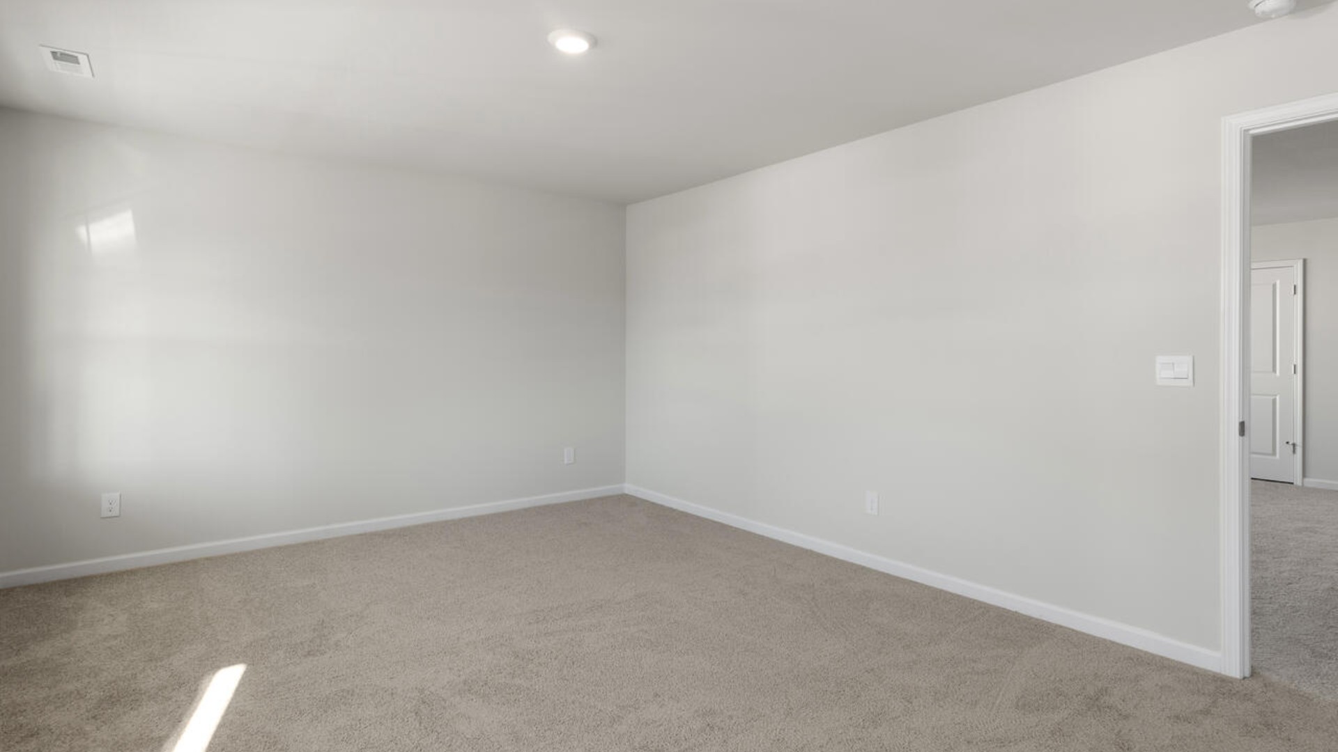 Upstairs you are greeted by a convenient loft, a laundry room, and the primary retreat, which boasts the suite's sitting room and substantial walk-in closet.