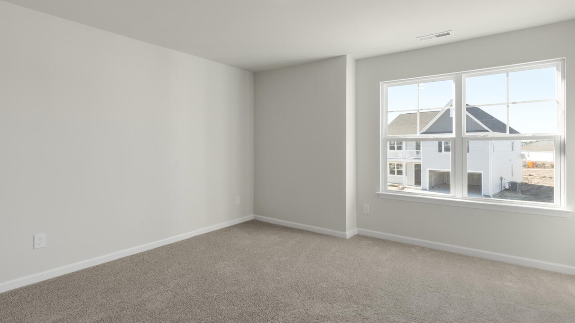 Upstairs you are greeted by a convenient loft, a laundry room, and the primary retreat, which boasts the suite's sitting room and substantial walk-in closet.