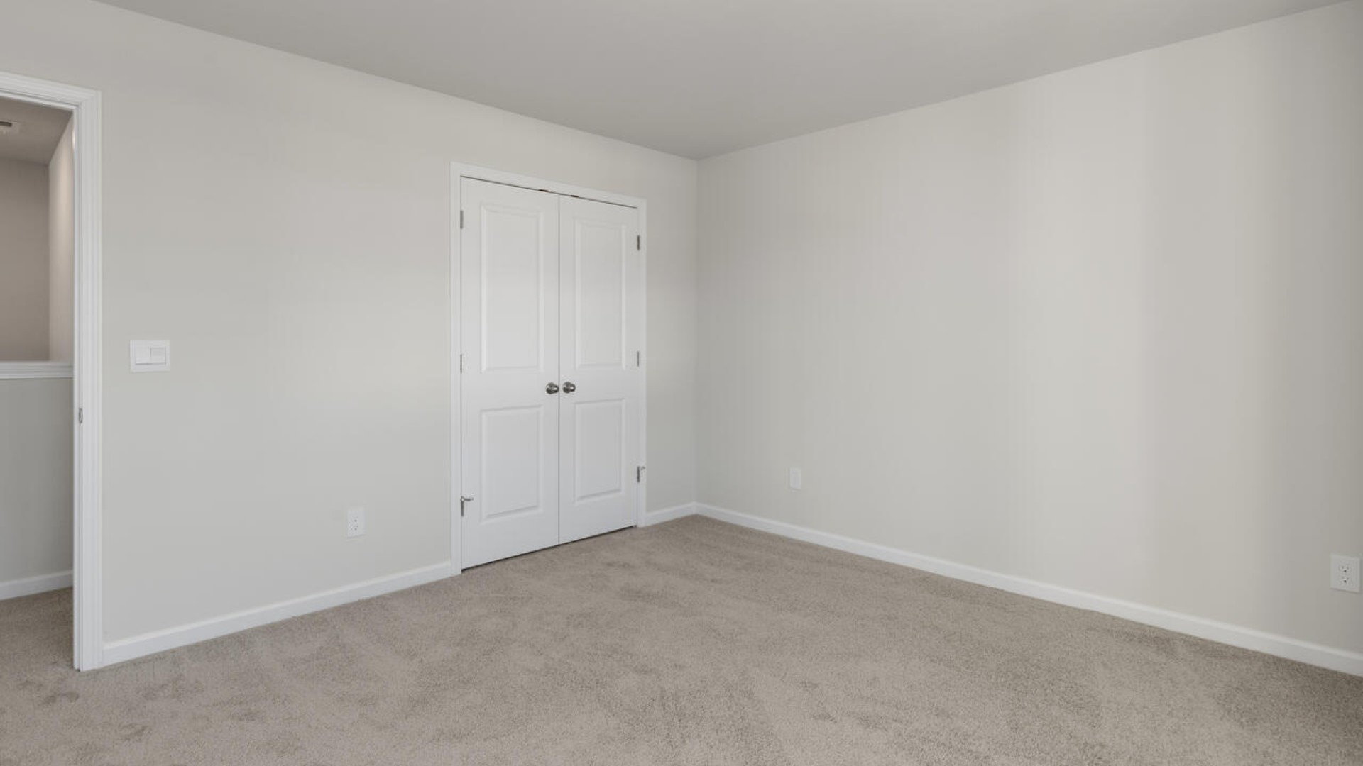 Upstairs you are greeted by a convenient loft, a laundry room, and the primary retreat, which boasts the suite's sitting room and substantial walk-in closet.