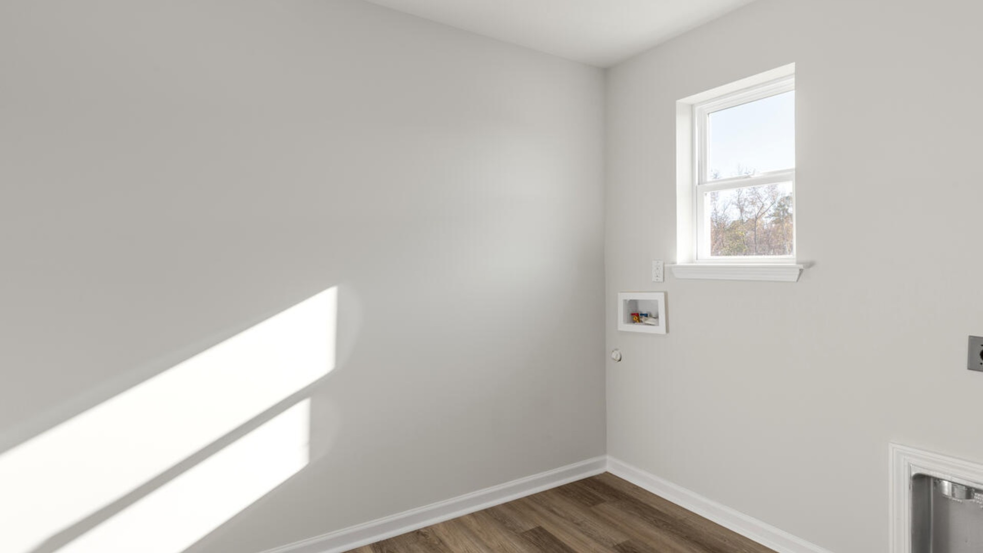 Upstairs you are greeted by a convenient loft, a laundry room, and the primary retreat, which boasts the suite's sitting room and substantial walk-in closet.