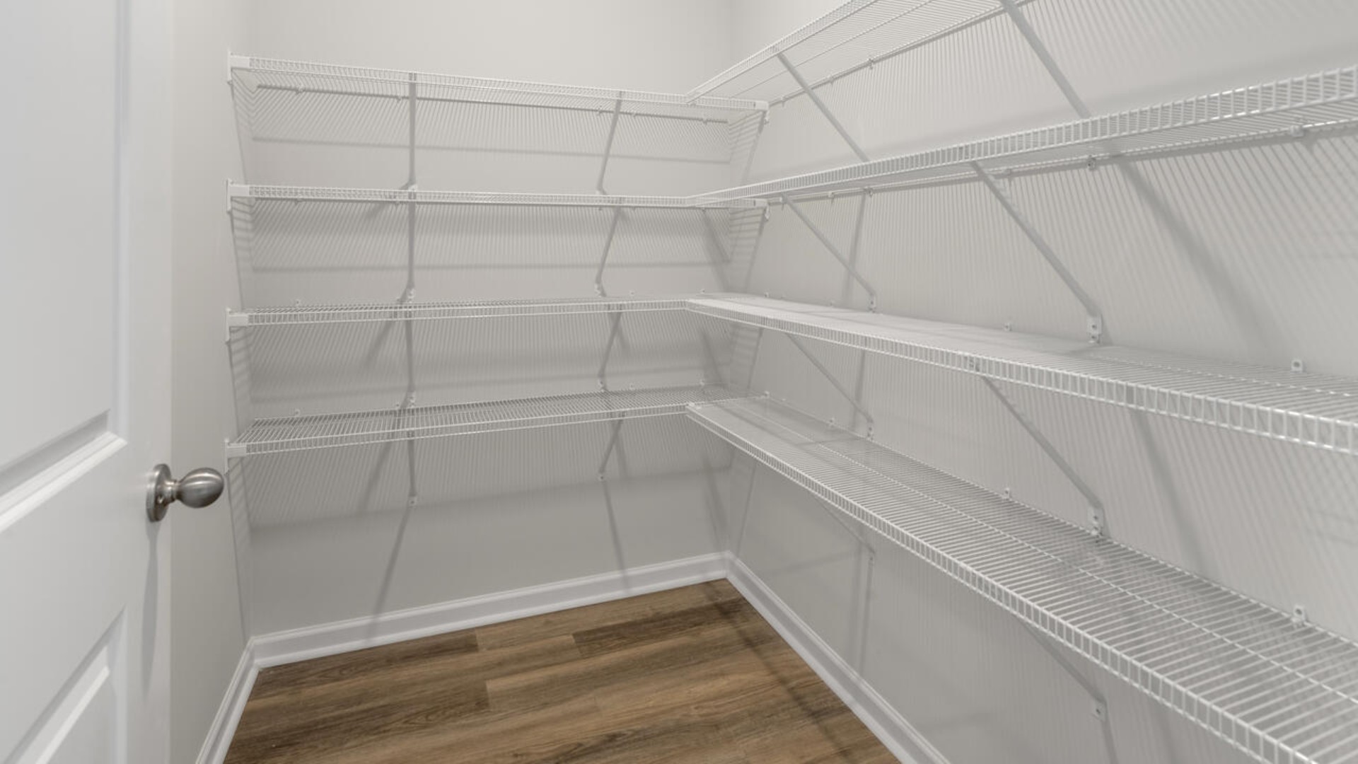 The kitchen is loaded with features including a granite island, 36'' cabinets, stainless-steel appliances and opens up to the living room.