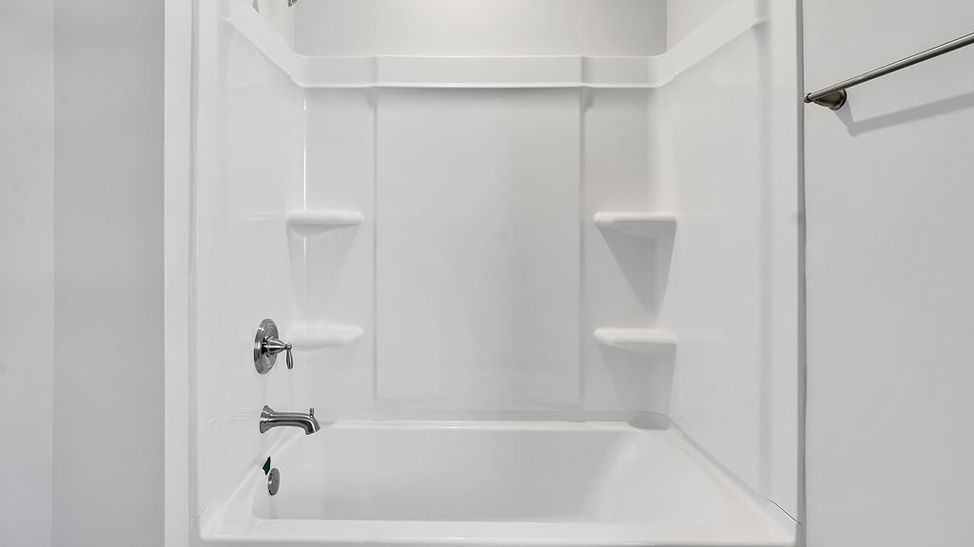 Upstairs, the crown jewel is the massive Primary Bedroom, a true owner’s getaway featuring tray ceiling details, abundant natural light, a spa-inspired bath with double vanities, and an oversized Walk-In Closet with integrated attic access.