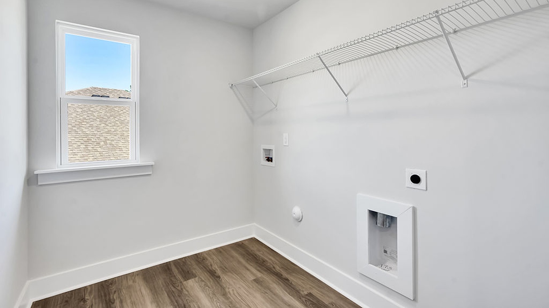 Upstairs, the crown jewel is the massive Primary Bedroom, a true owner’s getaway featuring tray ceiling details, abundant natural light, a spa-inspired bath with double vanities, and an oversized Walk-In Closet with integrated attic access.