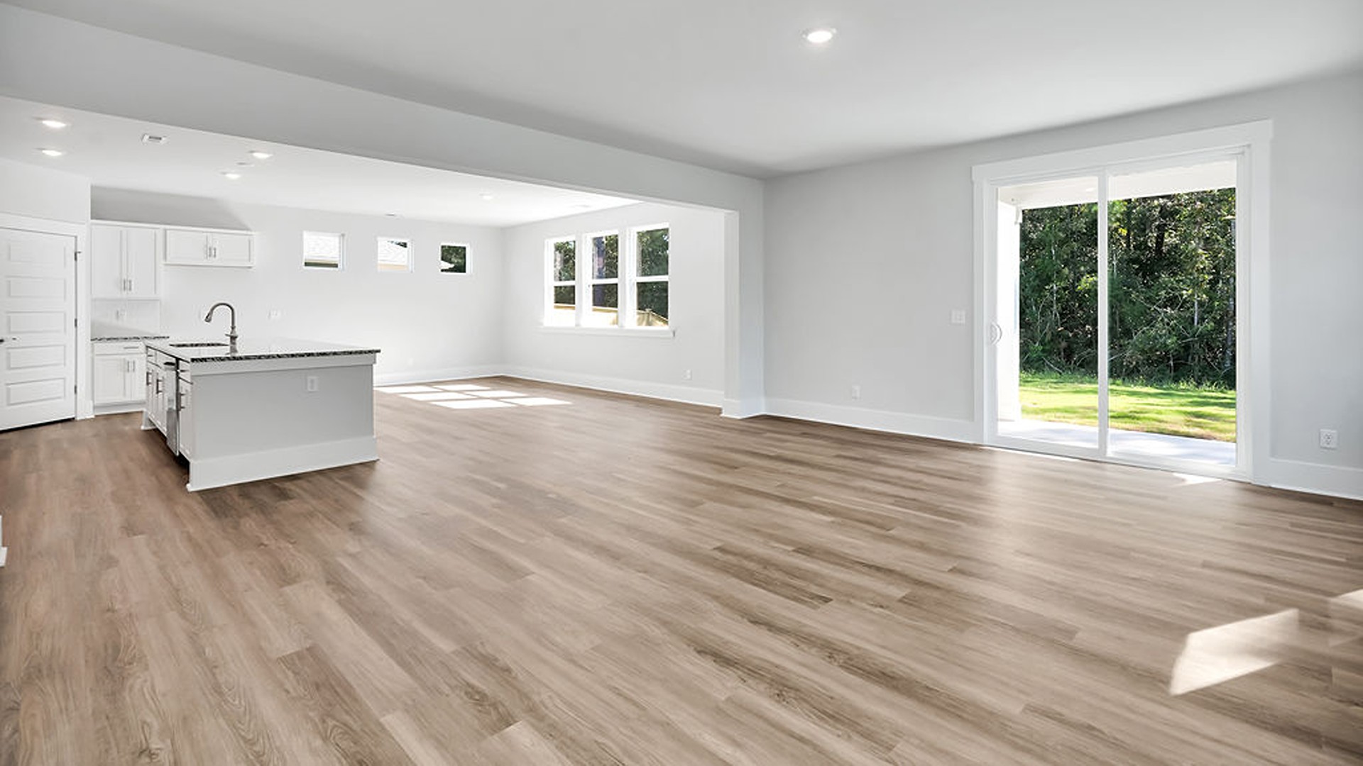The Glencoe floor plan blends open-concept design with versatile retreats. Step through the inviting covered porch into a dedicated foyer that opens to a main-level entertainer’s dream.