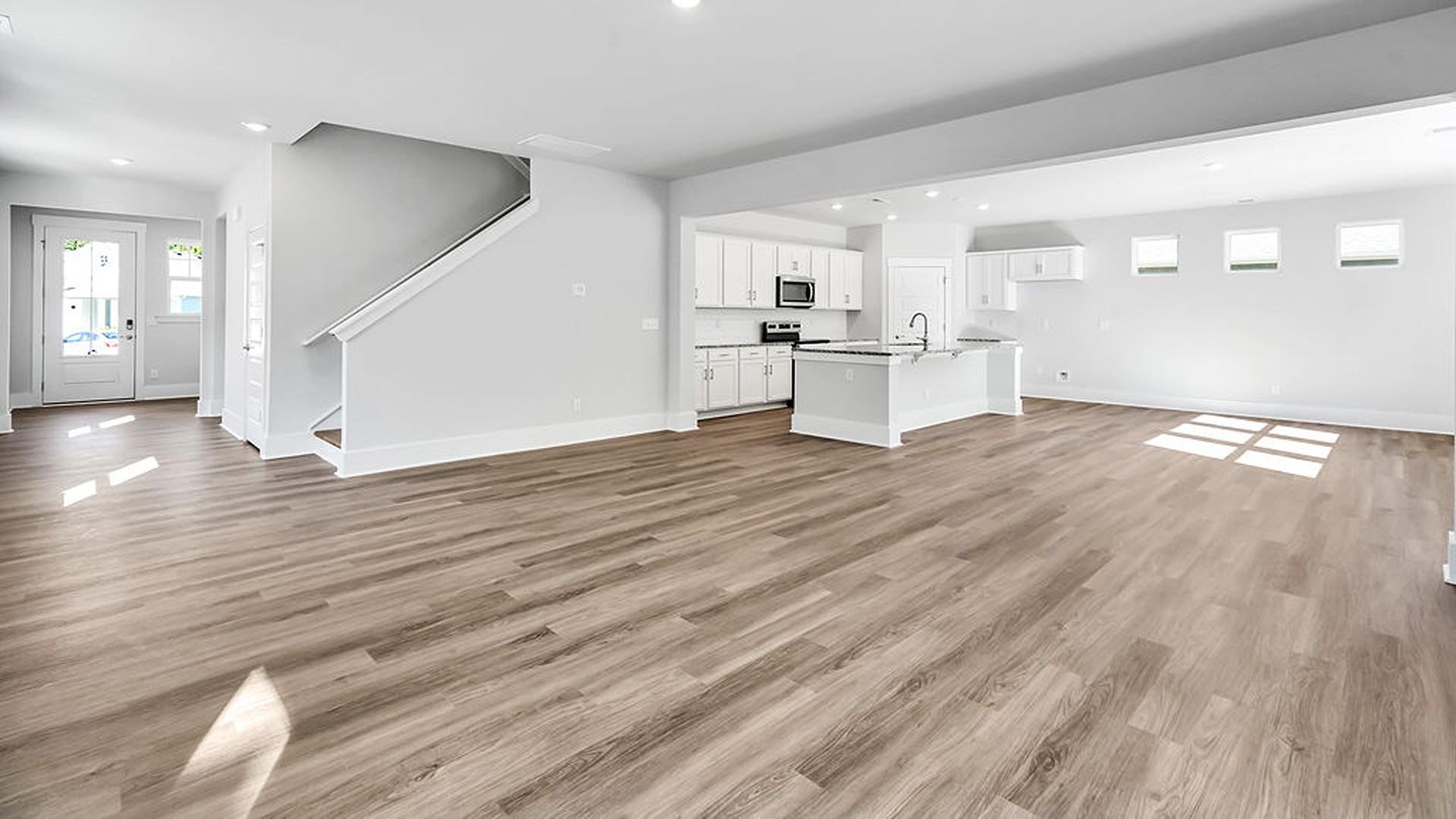 The Glencoe floor plan blends open-concept design with versatile retreats. Step through the inviting covered porch into a dedicated foyer that opens to a main-level entertainer’s dream.