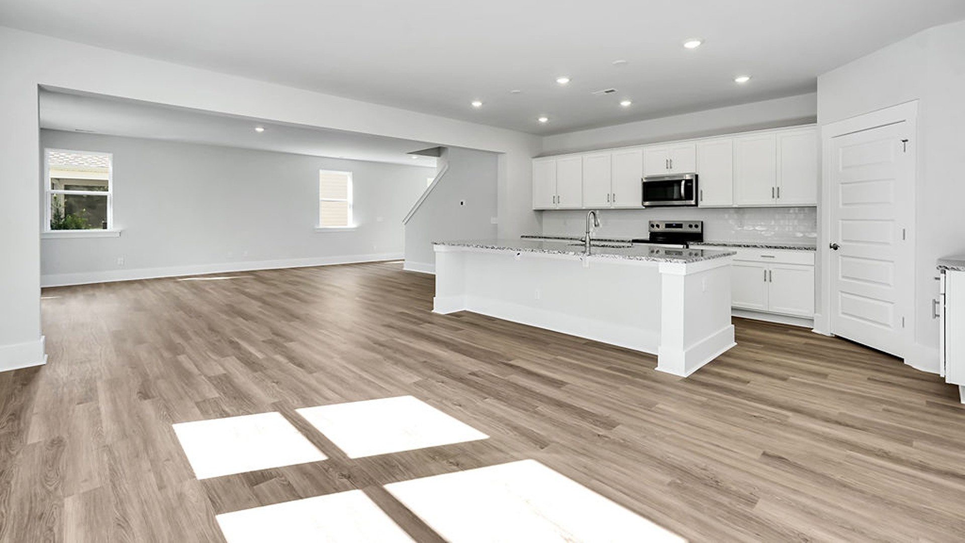 The Glencoe floor plan blends open-concept design with versatile retreats. Step through the inviting covered porch into a dedicated foyer that opens to a main-level entertainer’s dream.