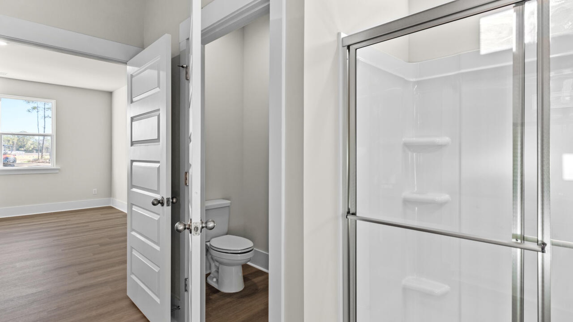 The primary bedroom has its own attached bathroom that features a walk-in closet and all the space you need to get ready in the morning.