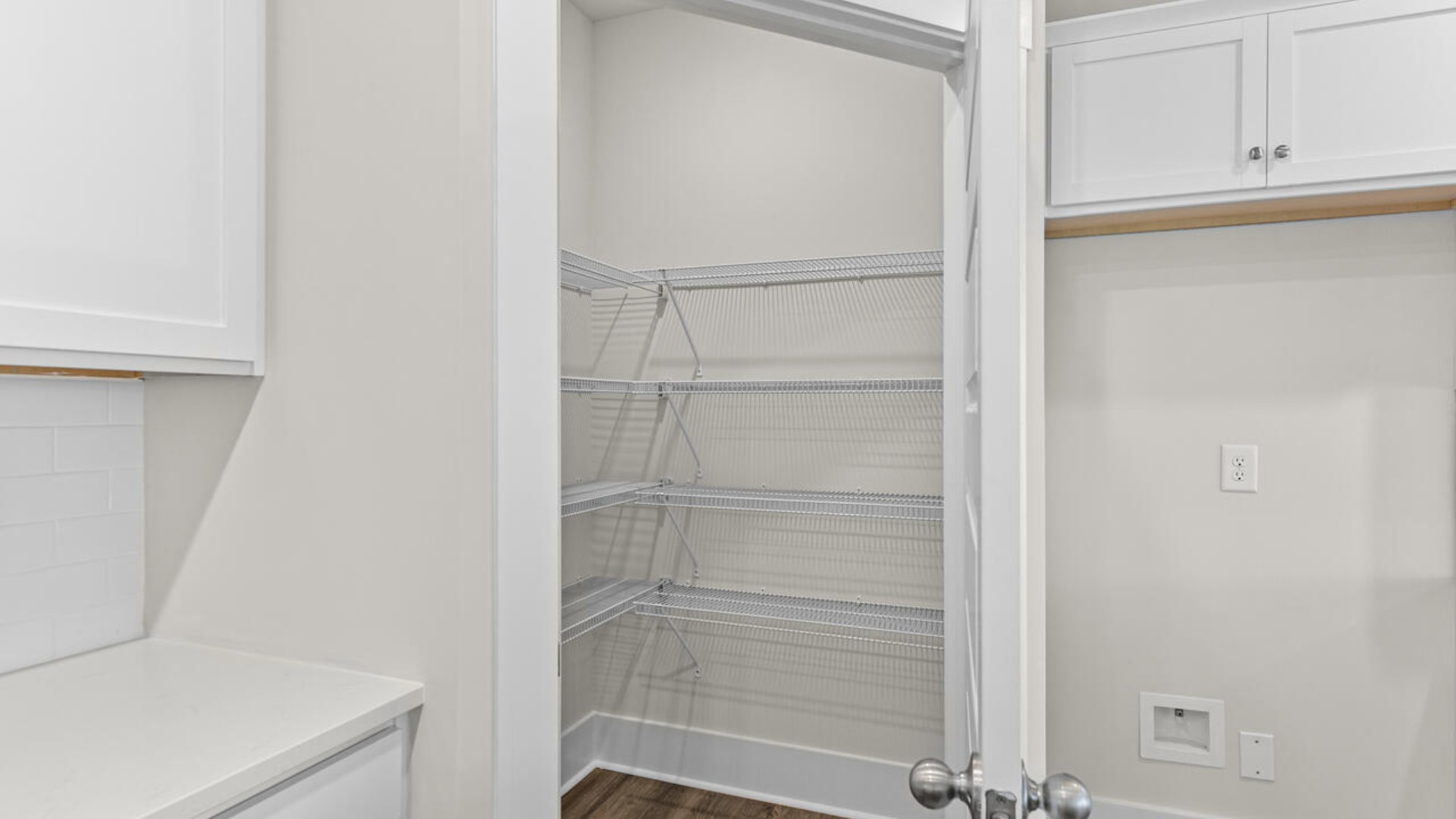 This open concept home features 9 ft. ceilings, granite kitchen counter tops, walk-in pantry, over-sized kitchen island, ample storage space, and granite countertops in the bathrooms.