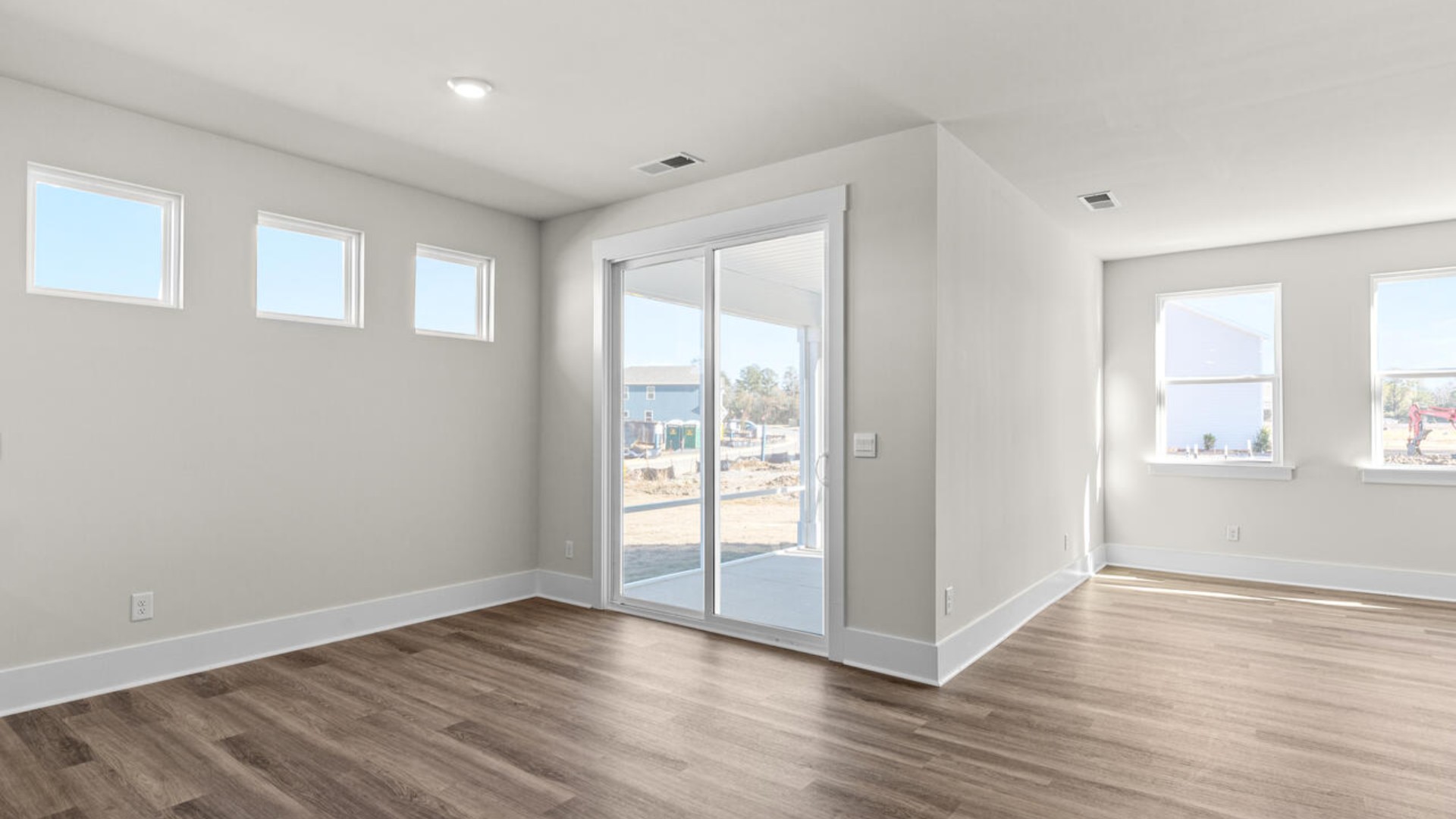 This open concept home features 9 ft. ceilings, granite kitchen counter tops, walk-in pantry, over-sized kitchen island, ample storage space, and granite countertops in the bathrooms.